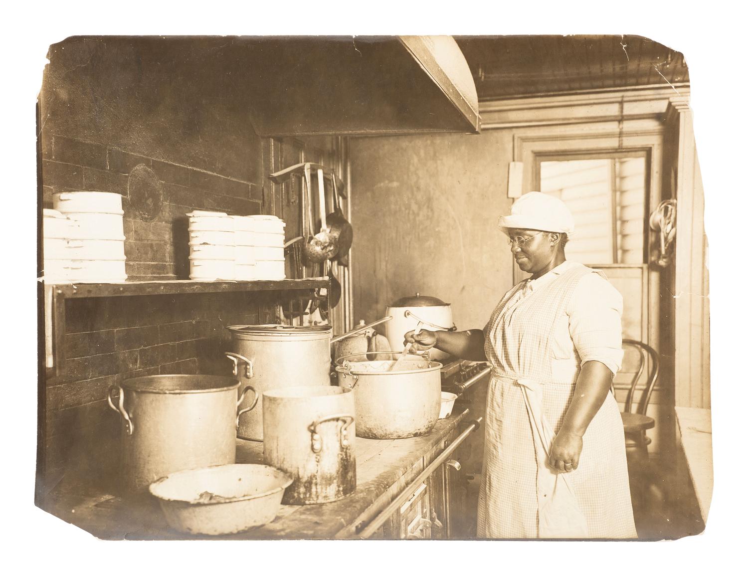 [AFRICAN AMERICANA]. 4 occupational photographs ft. African American subjects wearing uniforms.