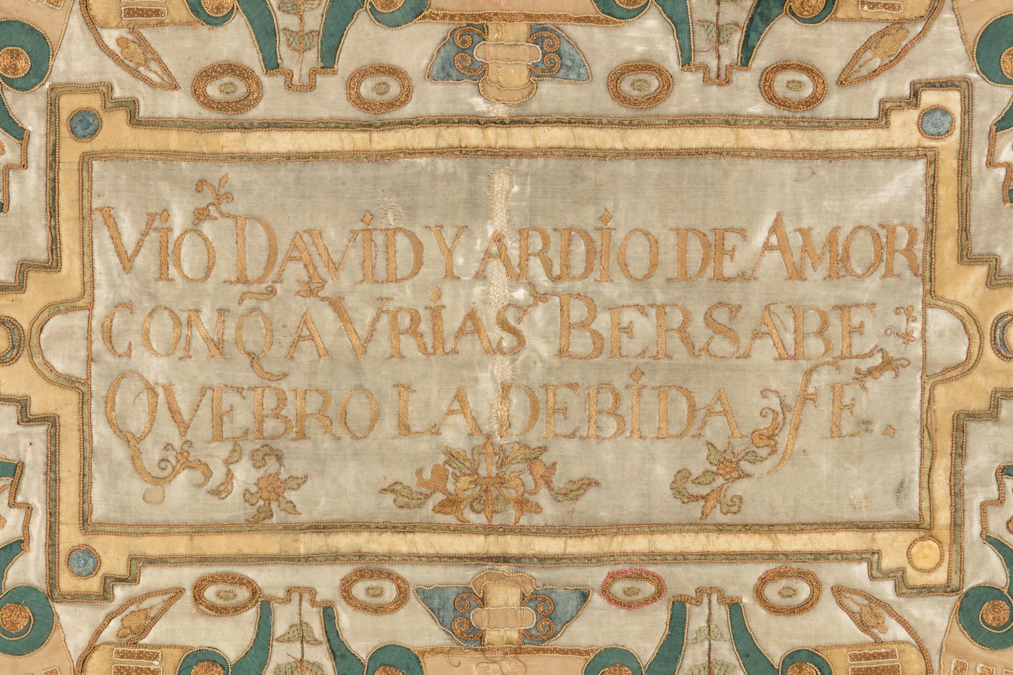 An Embroidered Silk Panel with Latin Script