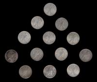 A Group of Thirteen United States Peace Silver Dollar Coins