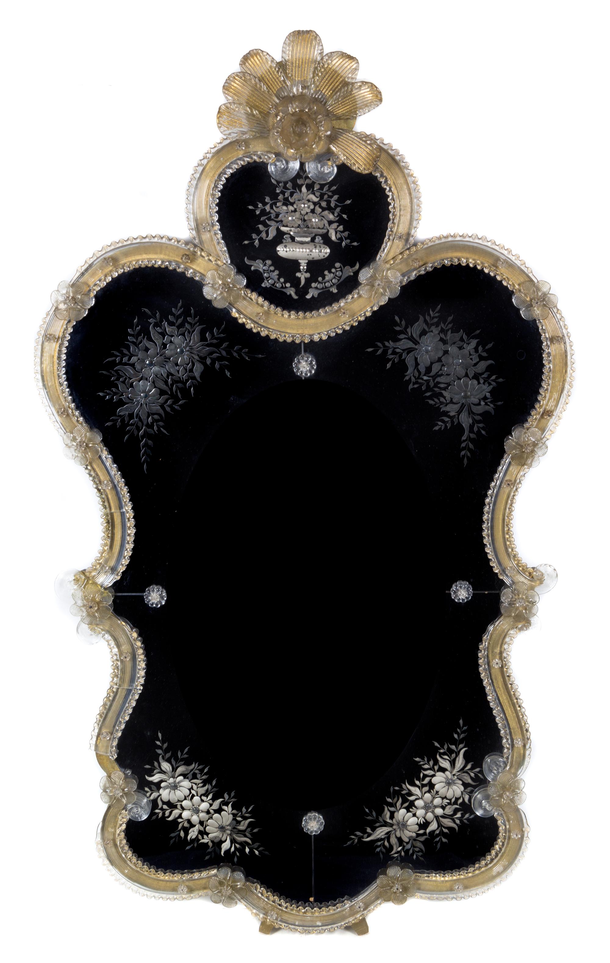 A Venetian Glass Mirror Height 39 x width 23 inches.
