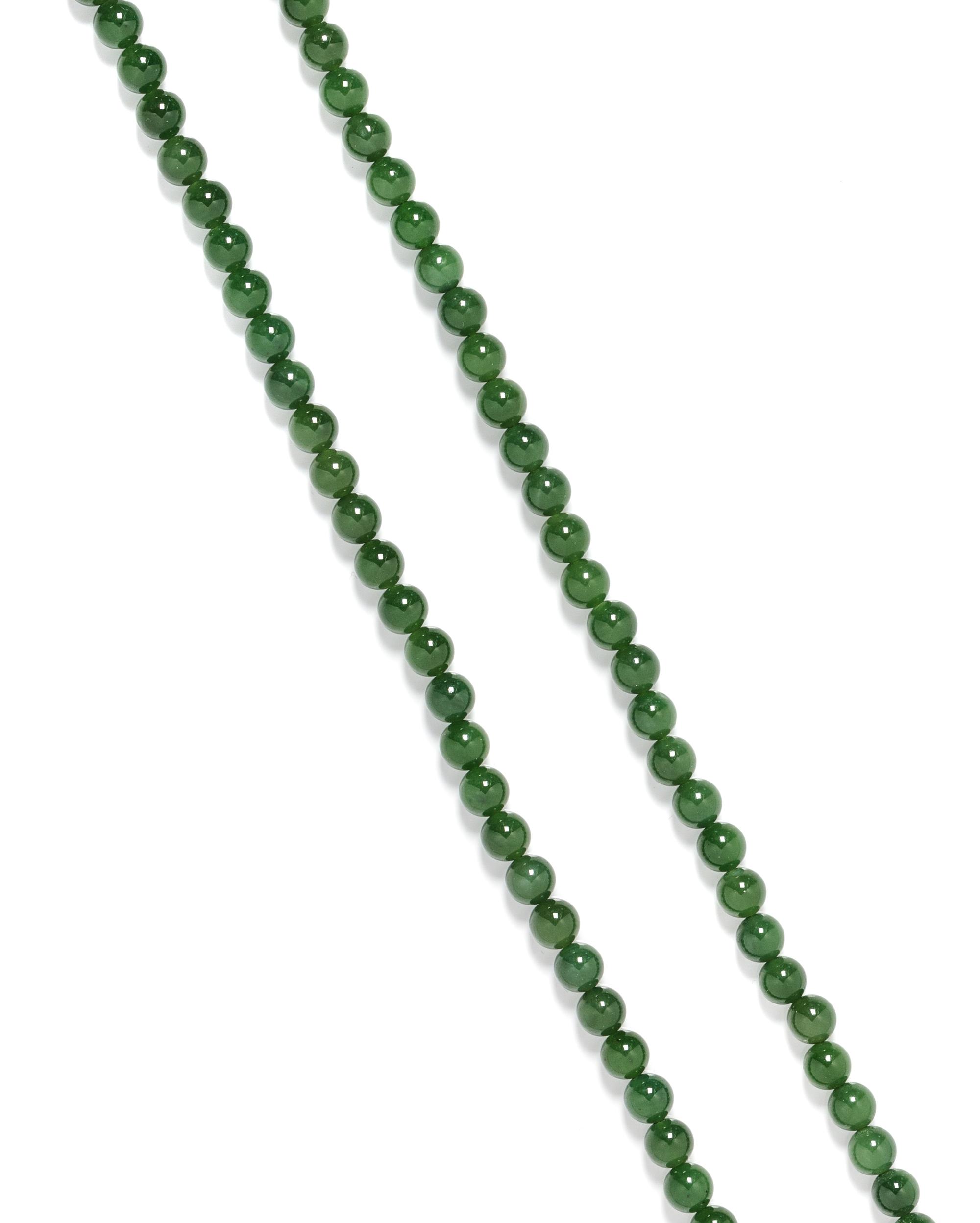 A Single Strand Nephrite Jade Bead Necklace,