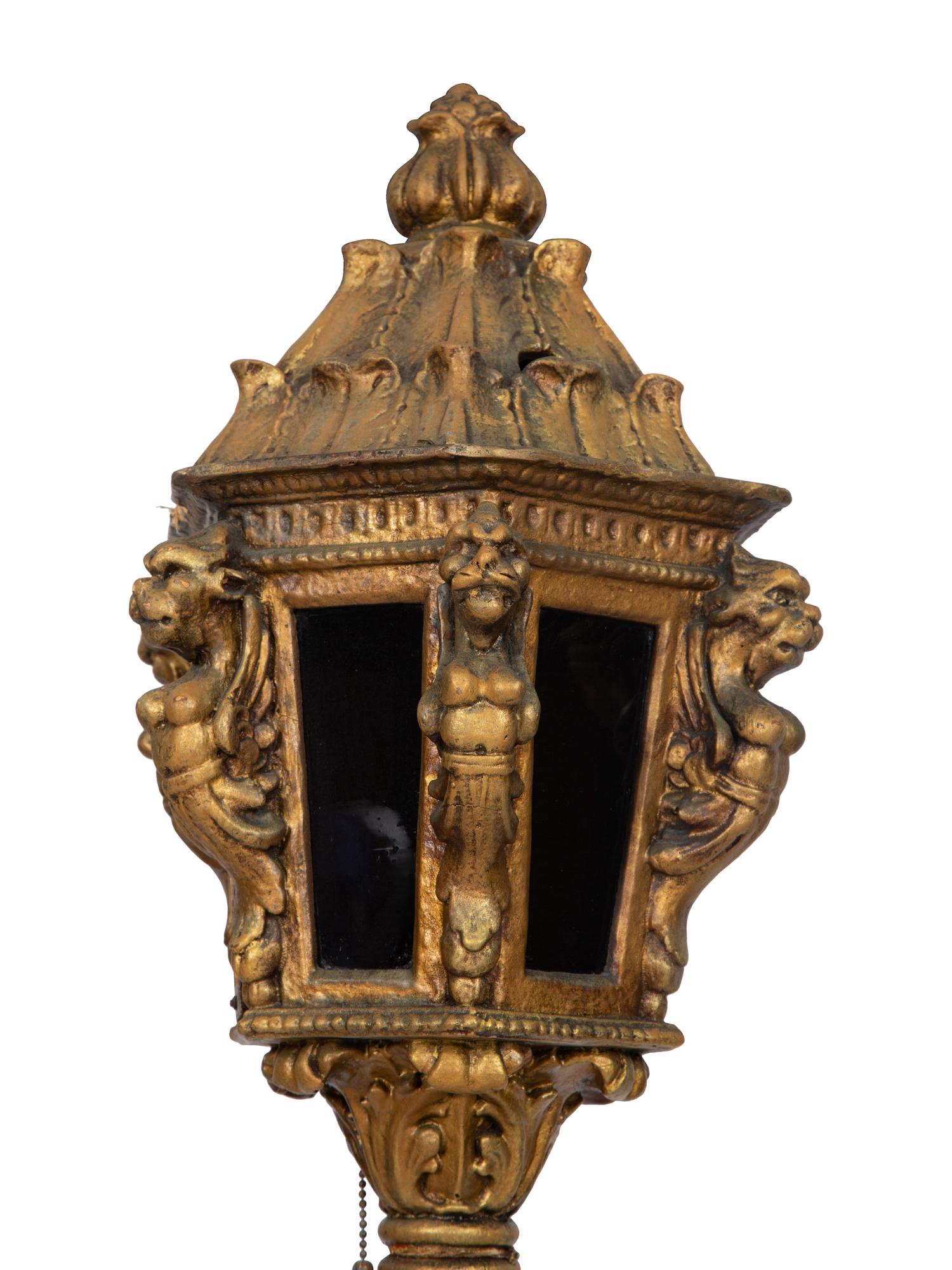 Four Italian Giltwood Gondola Lanterns on Ebonized Supports