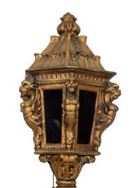 Four Italian Giltwood Gondola Lanterns on Ebonized Supports