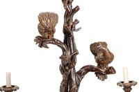 A Black Forest Style Patinated Bronze Chandelier