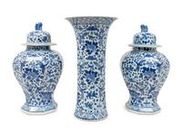A Chinese Blue and White Porcelain Three-Piece Garniture and a Delft Fluted Vase — 20TH CENTURY