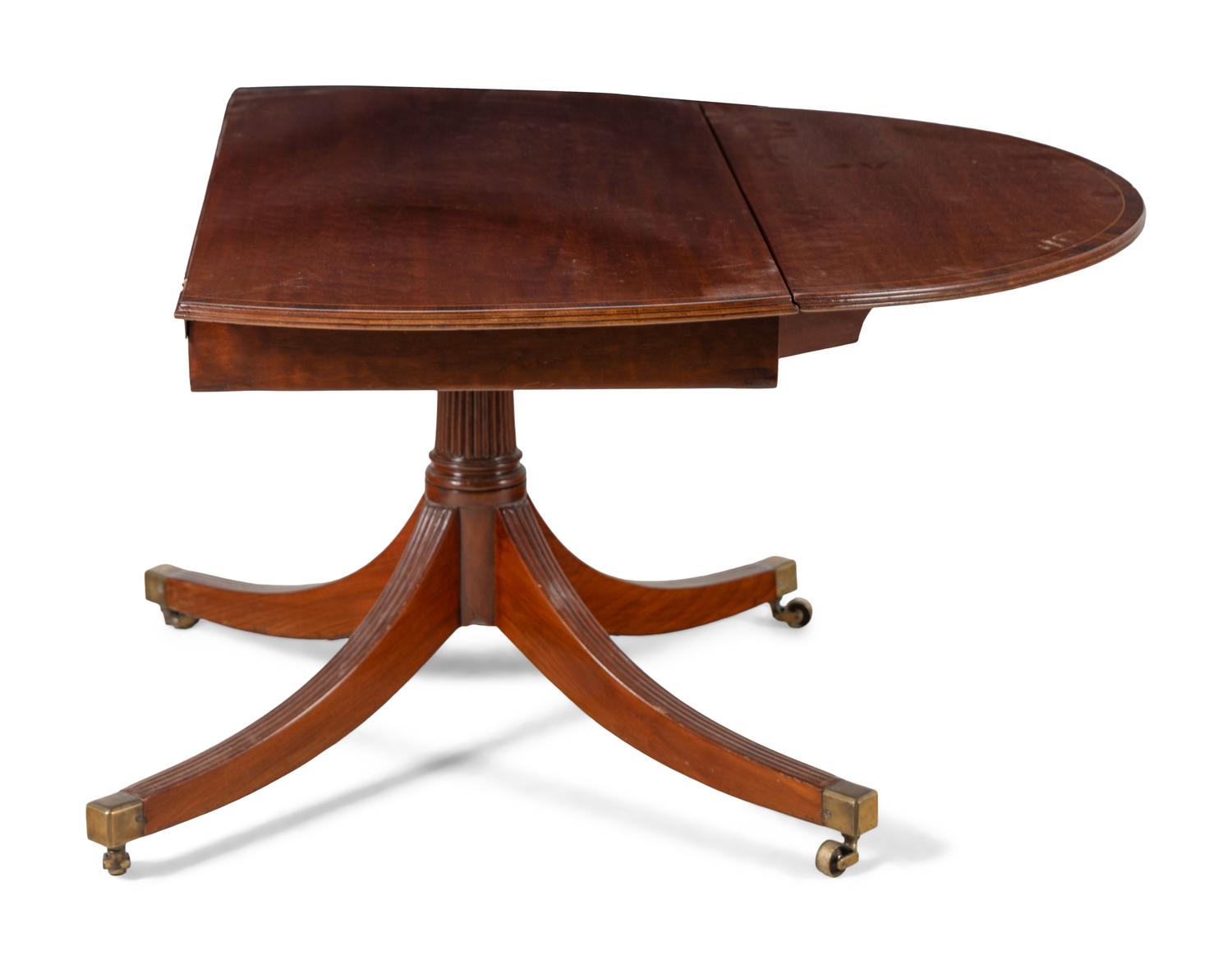 A Regency Inlaid Mahogany Drop Leaf Dining Table