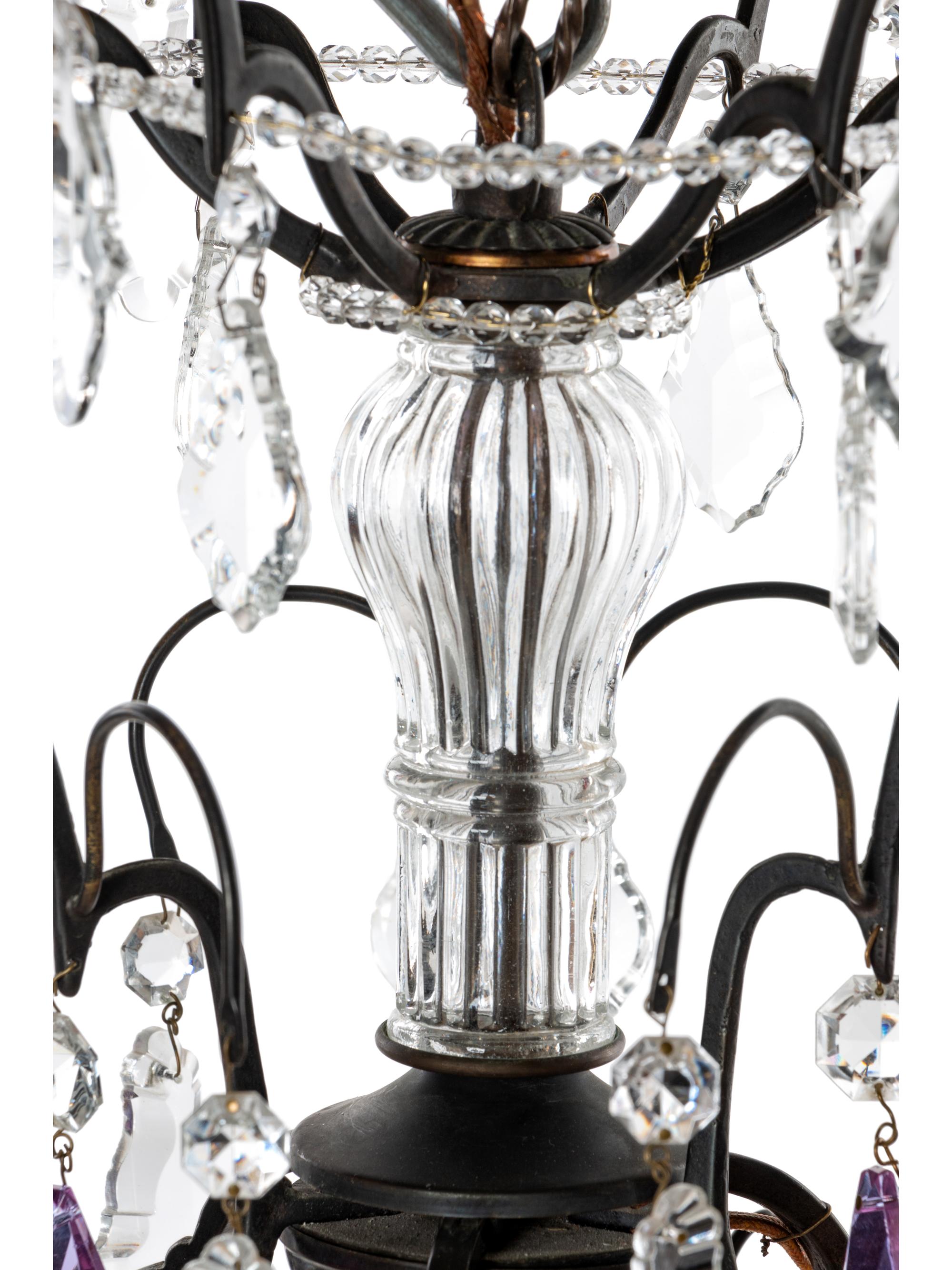 A French Bronze and Cut Glass Eight-Light Chandelier