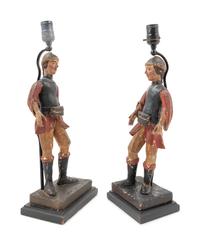 A Pair of Spanish Carved and Polychrome Decorated Figures