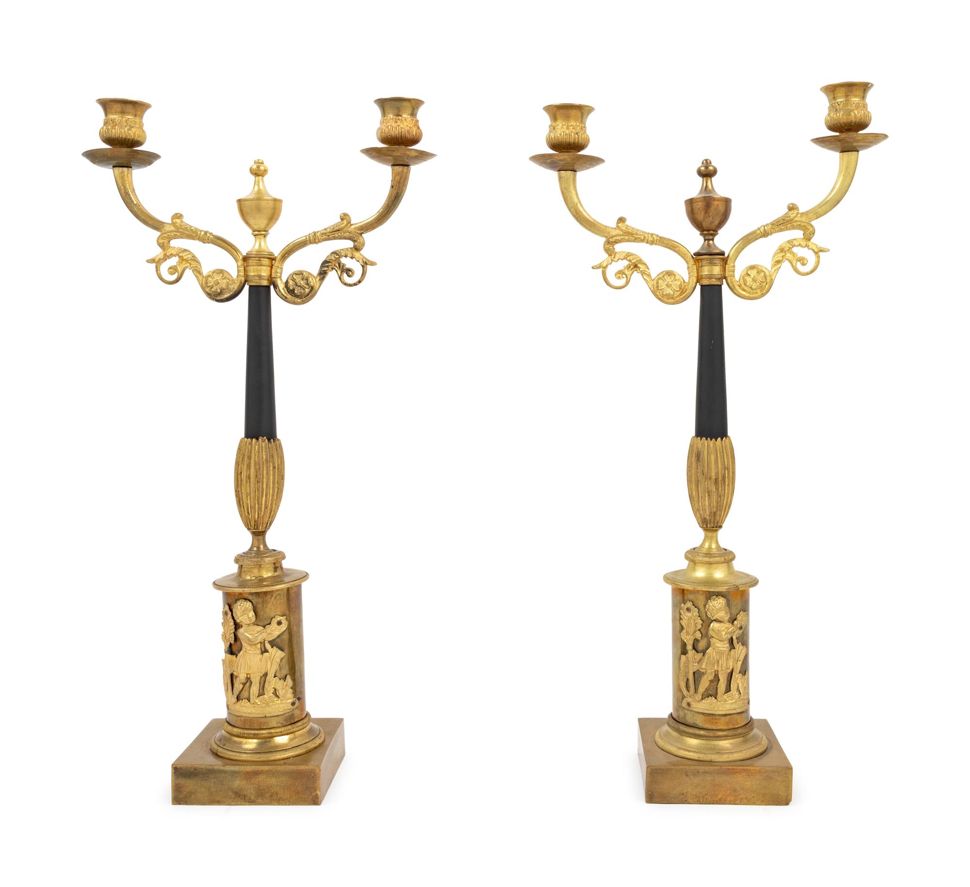 A Pair of Empire Style Gilt and Patinated Bronze Two-Light Candelabra