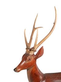 A Pair of Carved Fruitwood and Antler Mounted Models of Deer