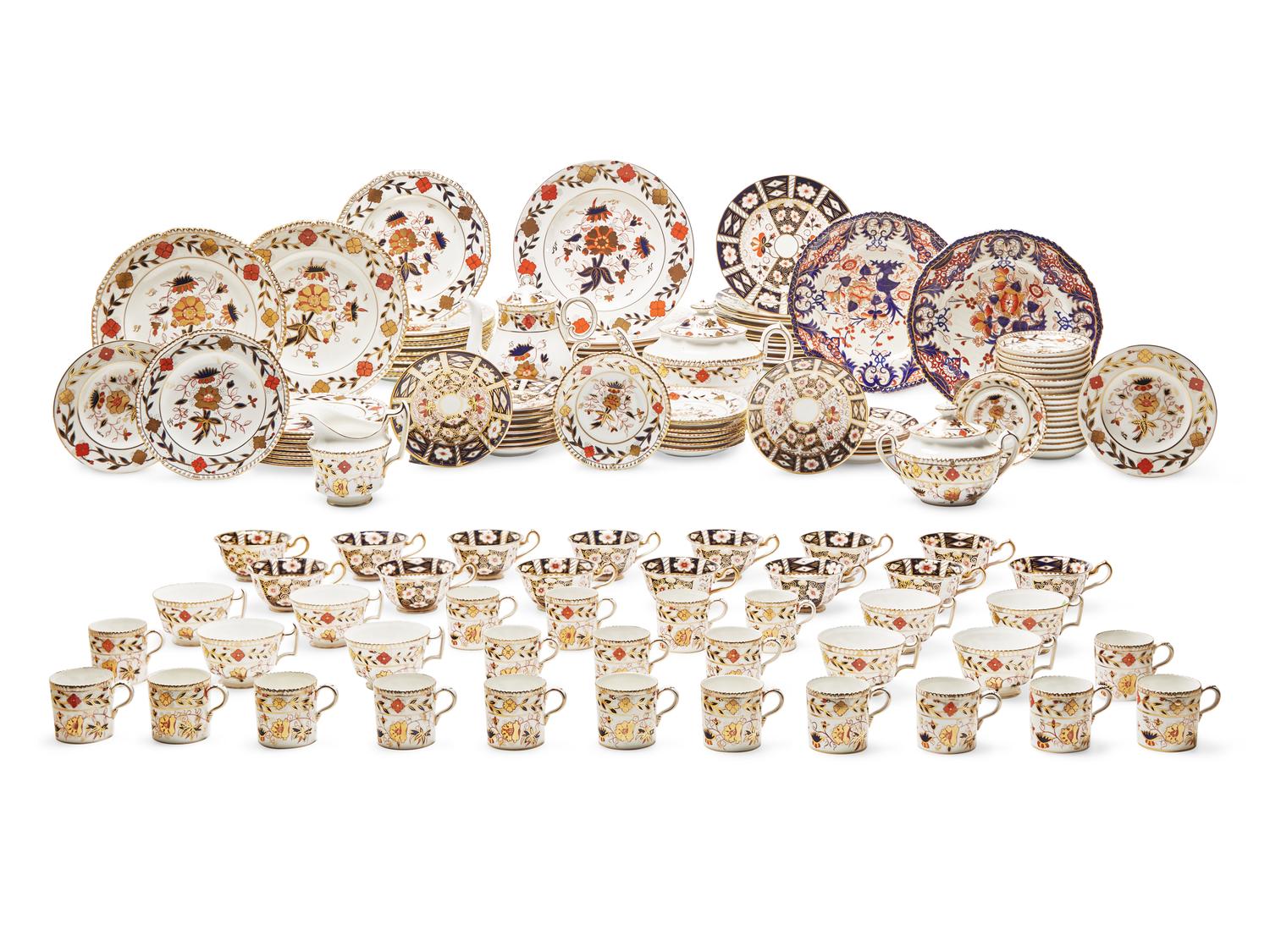 An Assembled Royal Crown Derby 'Asian Rose' and 'Imari' Porcelain Dinner Service