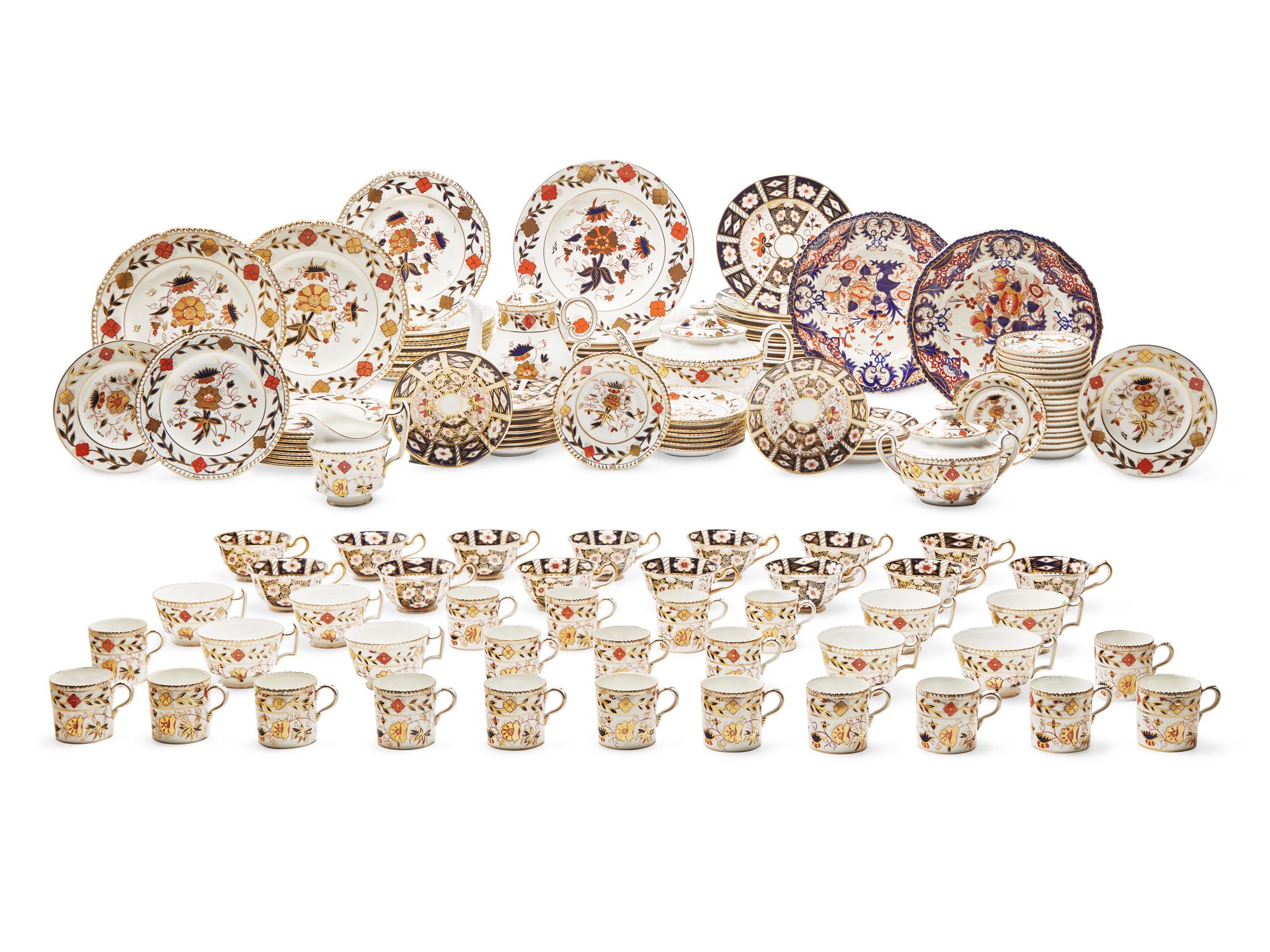 An Assembled Royal Crown Derby 'Asian Rose' and 'Imari' Porcelain Dinner Service