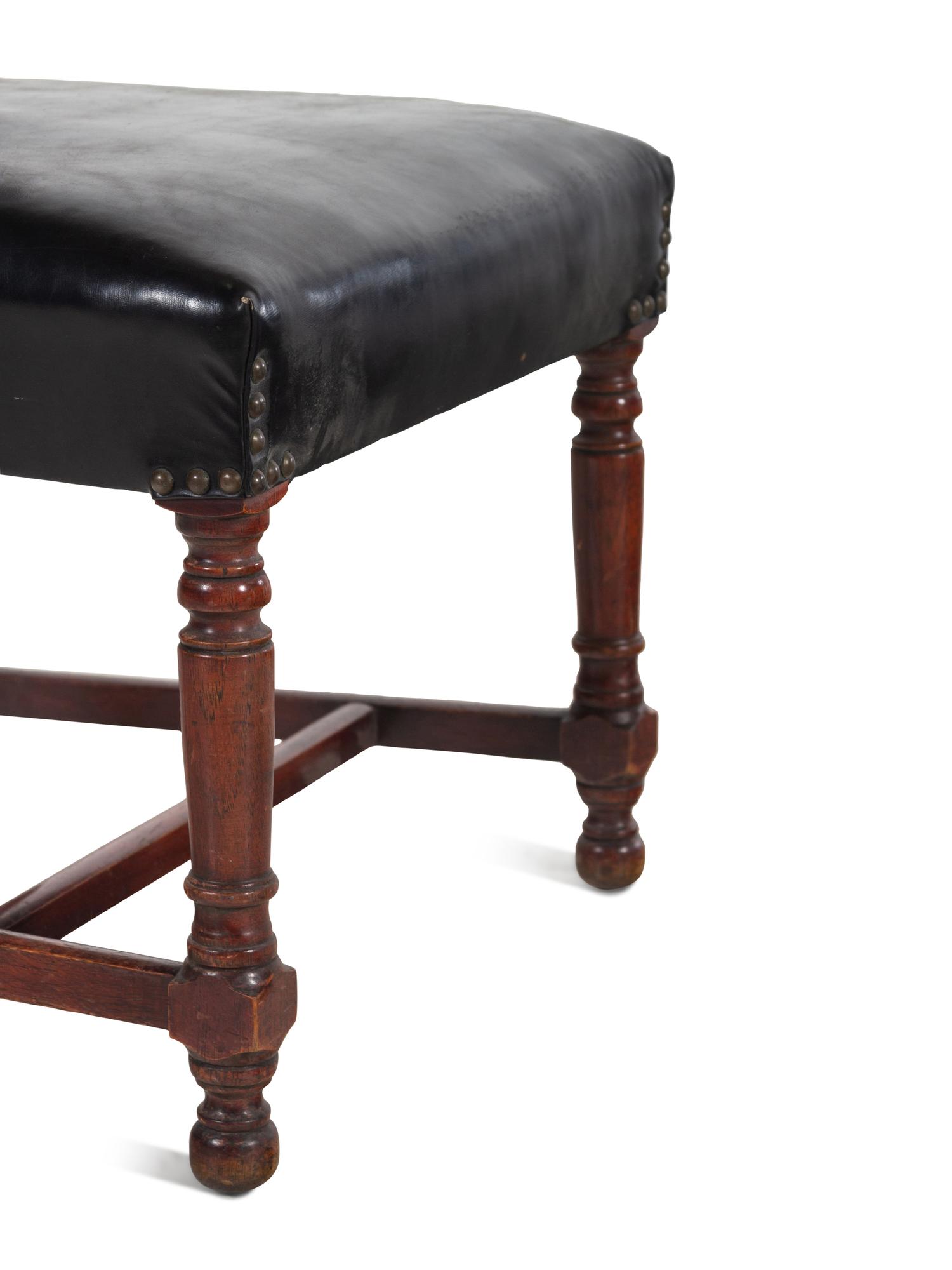 A Pair of Leather-Upholstered Side Chairs