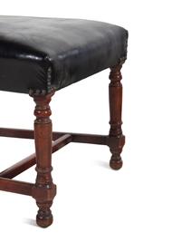 A Pair of Leather-Upholstered Side Chairs