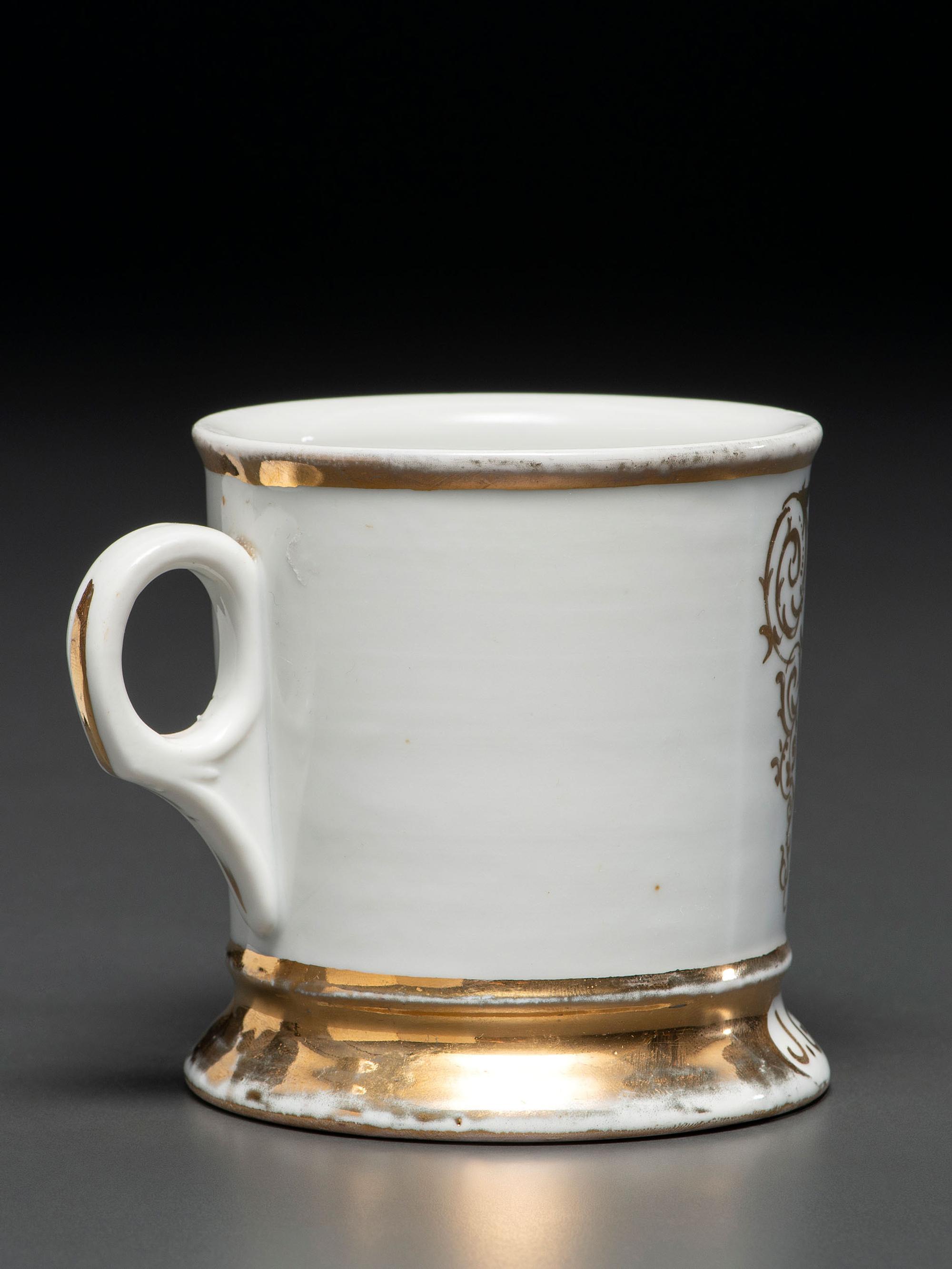 A Photographic Transfer Porcelain Shaving Mug Depicting the Arion Theatre, New York