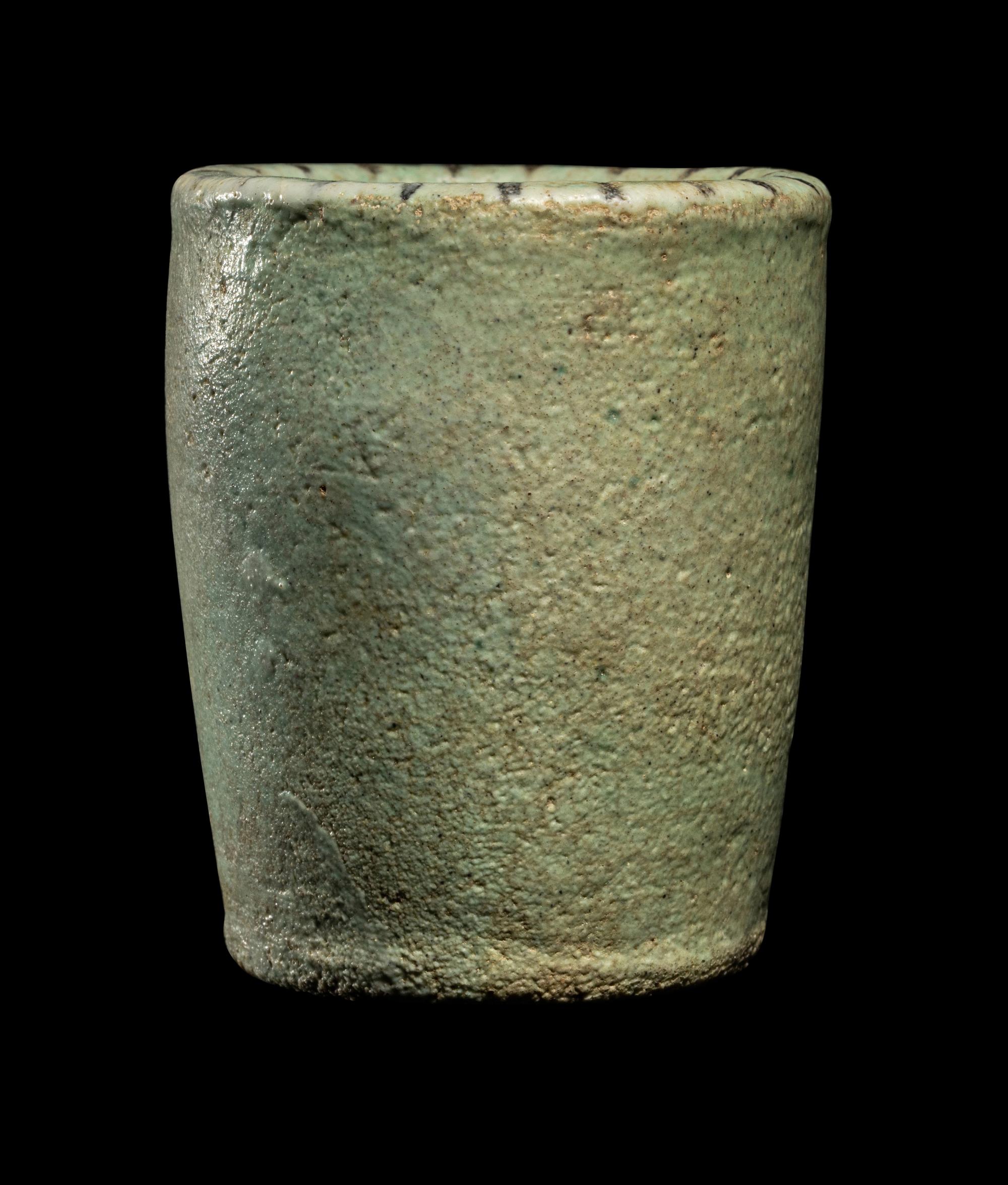 An Egyptian Faience Model Cup