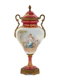 A Gilt Metal Mounted Sèvres Style Porcelain Urn