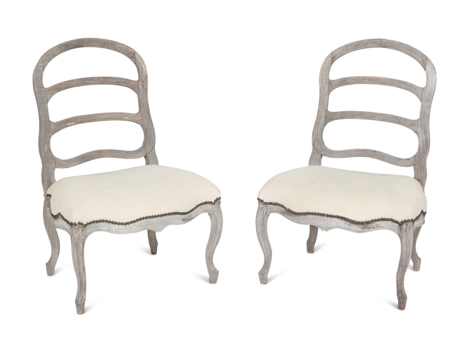 A Pair of Sutherland French Provincial Style Distressed Teak Side Chairs