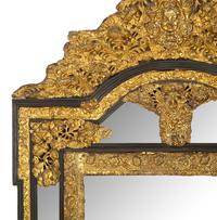 A Régence Style Pressed Brass Mirror
