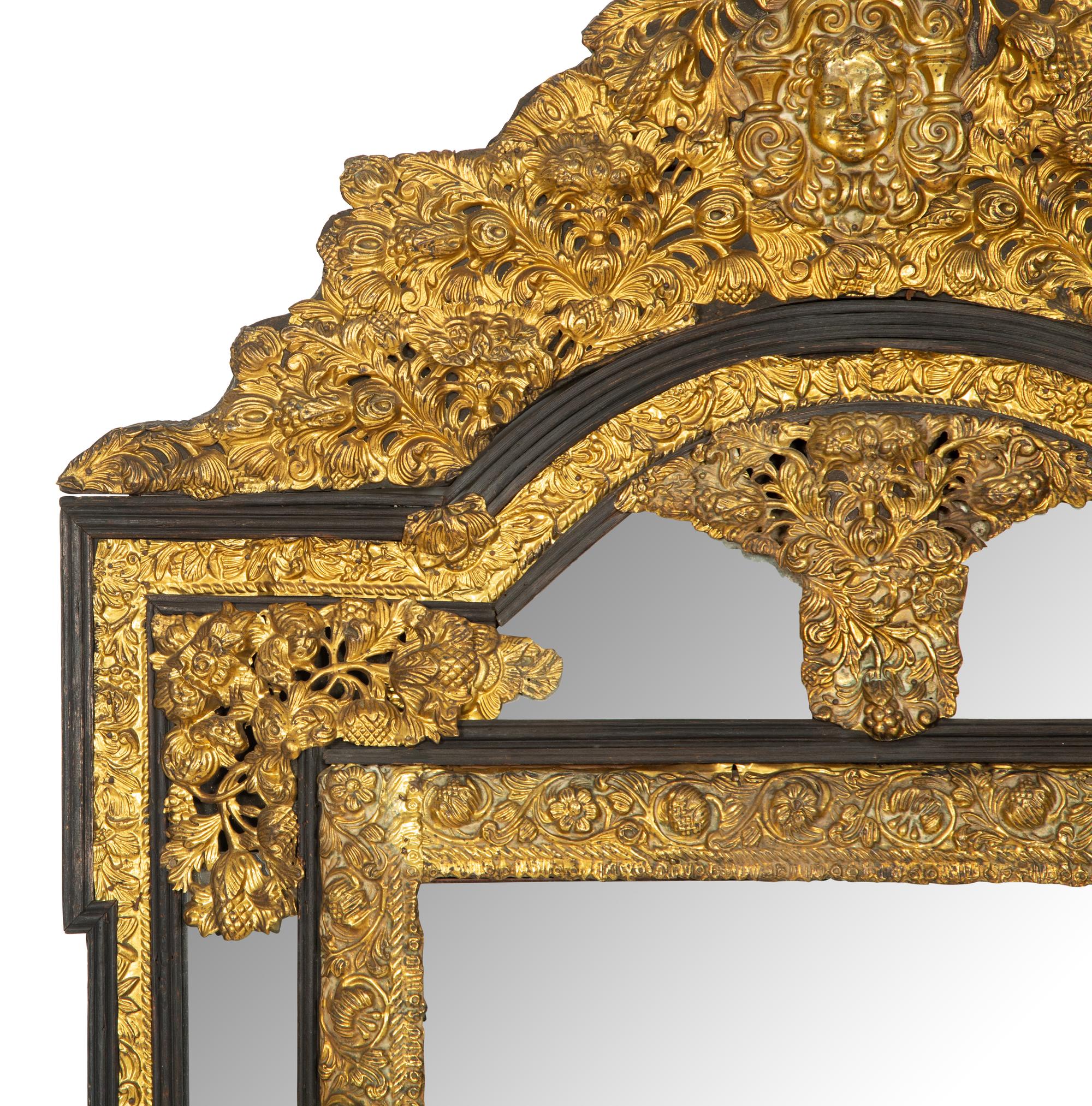 A Régence Style Pressed Brass Mirror