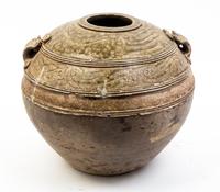A Large Glazed Pottery Jar Height 12 inches.