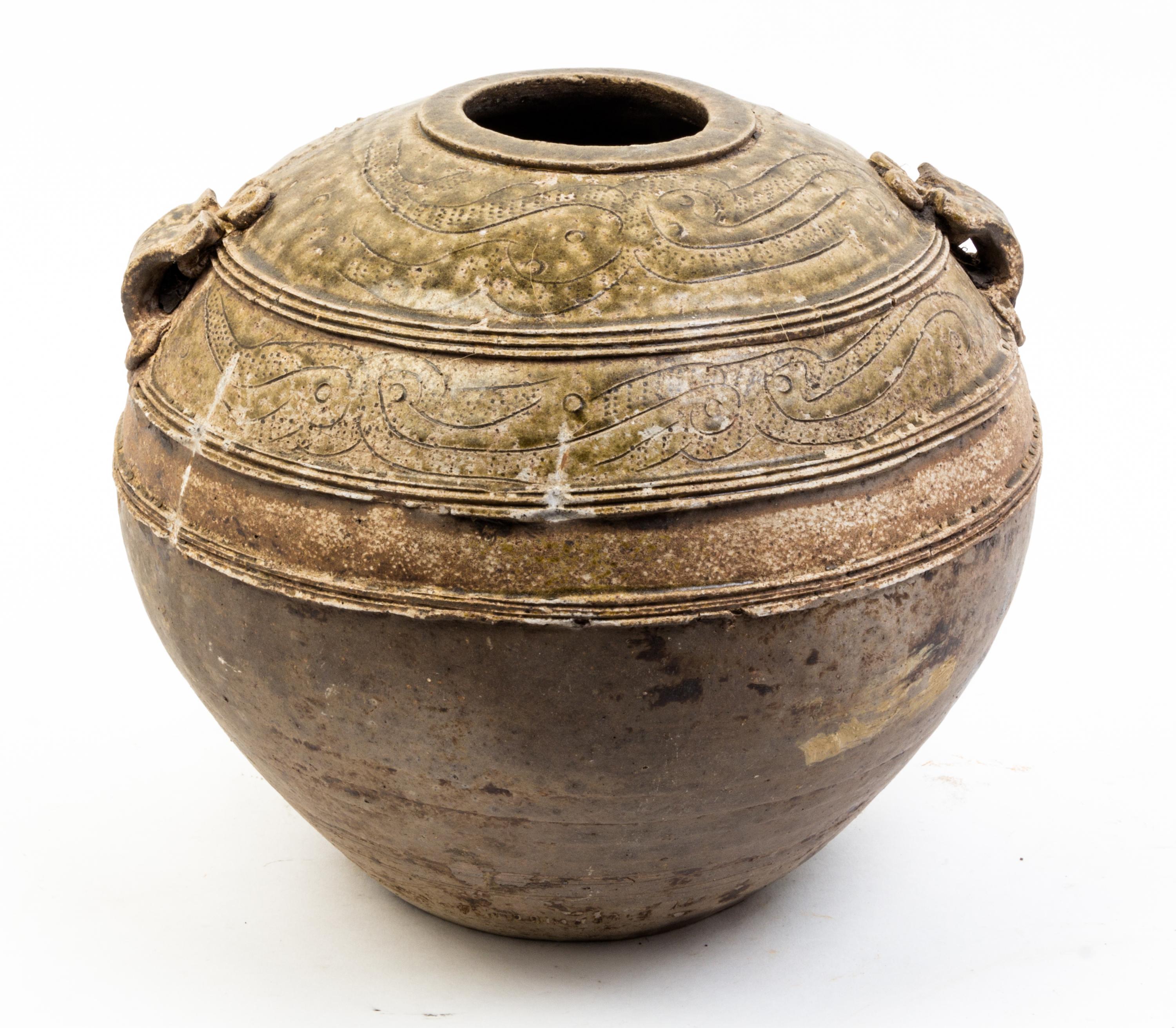 A Large Glazed Pottery Jar Height 12 inches.