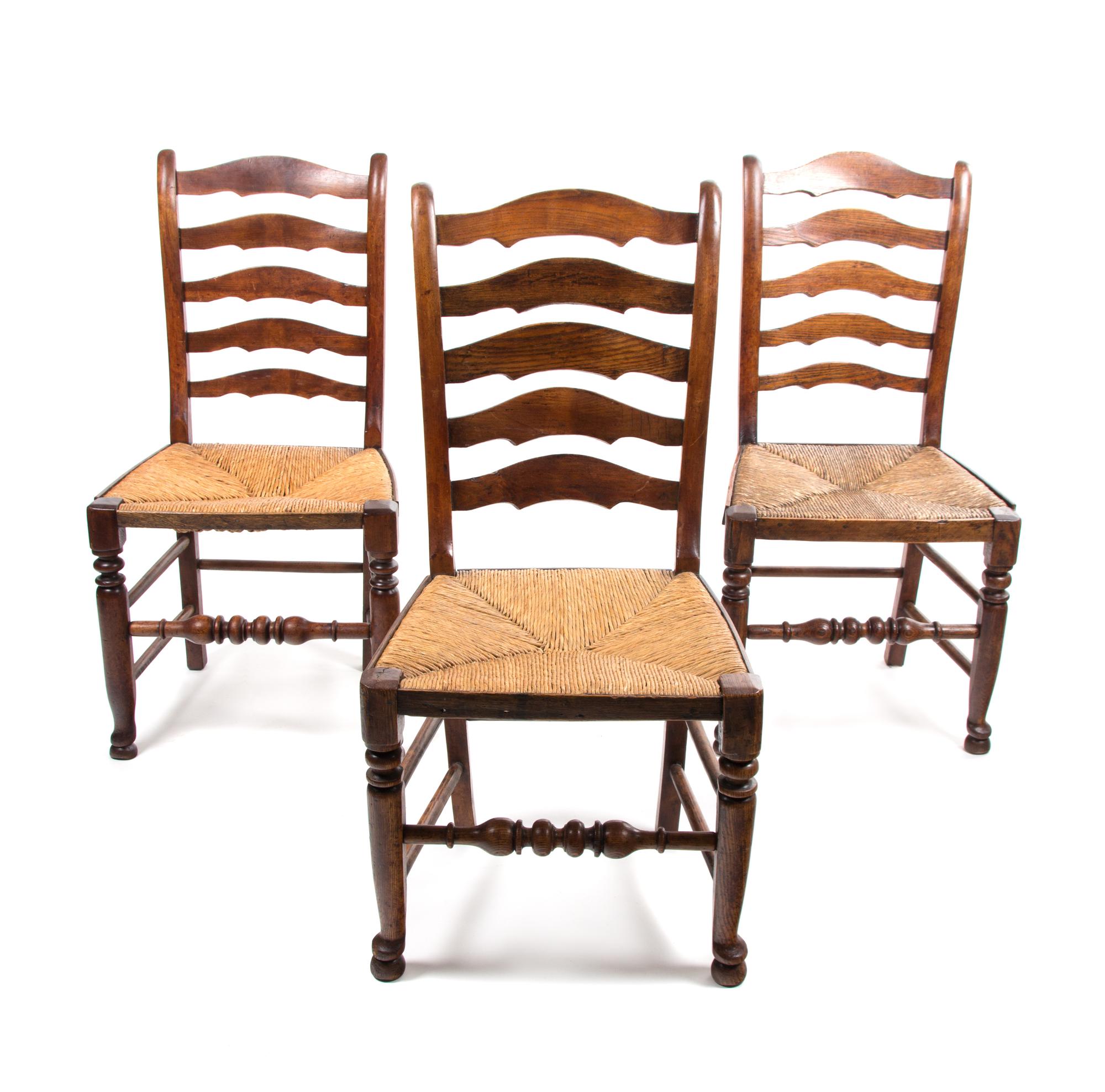 A Set of Six Provincial Oak Ladderback Chairs Height 38 inches. — 19TH CENTURY