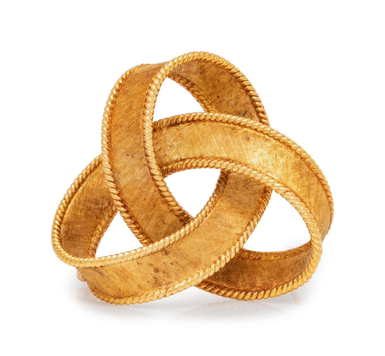 An 18 Karat Yellow Gold Knot Motif Brooch,