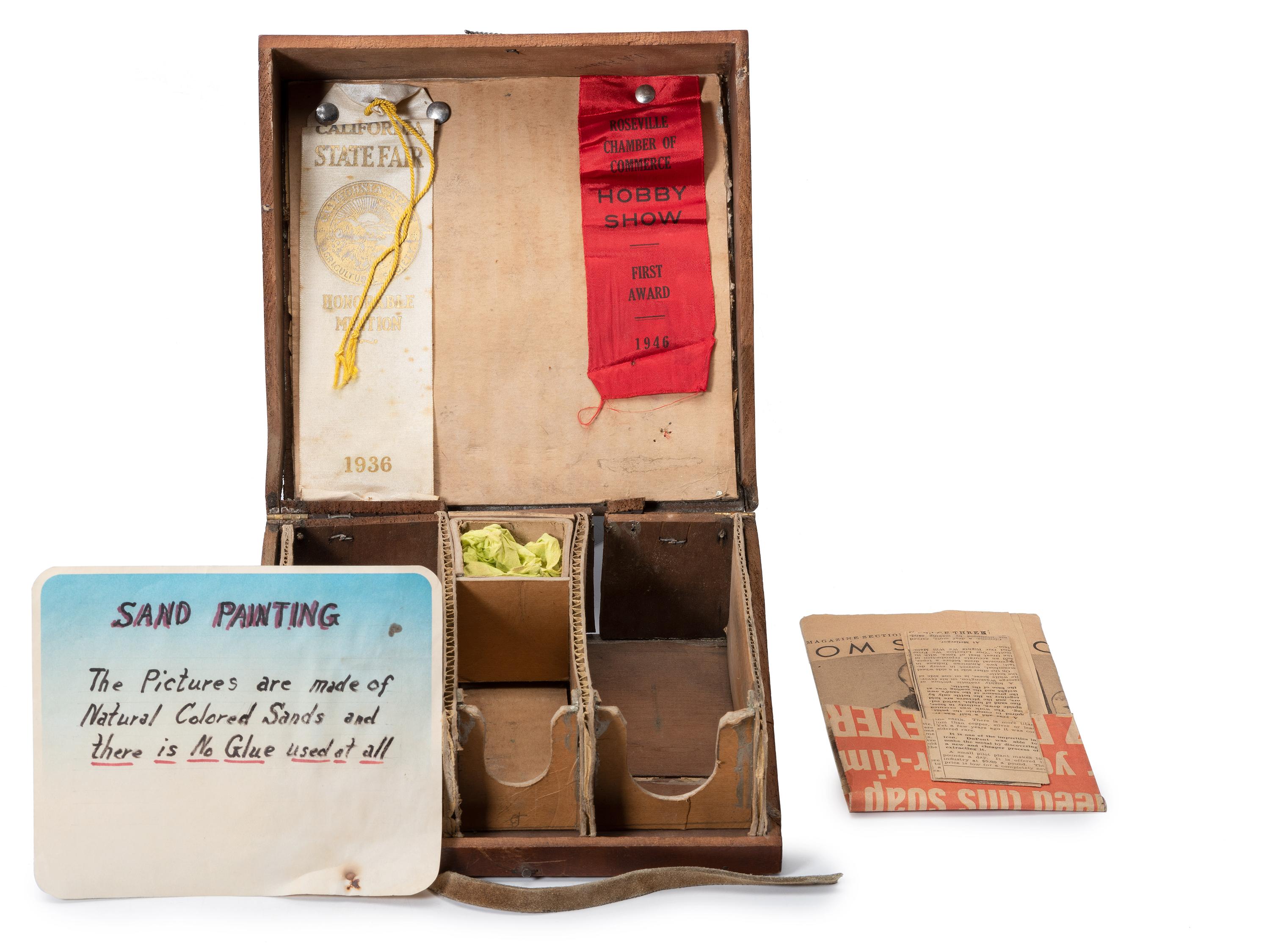 A Collection of John A. Adams Sand Art Bottles, Along with Custom Box and Unused Bottle