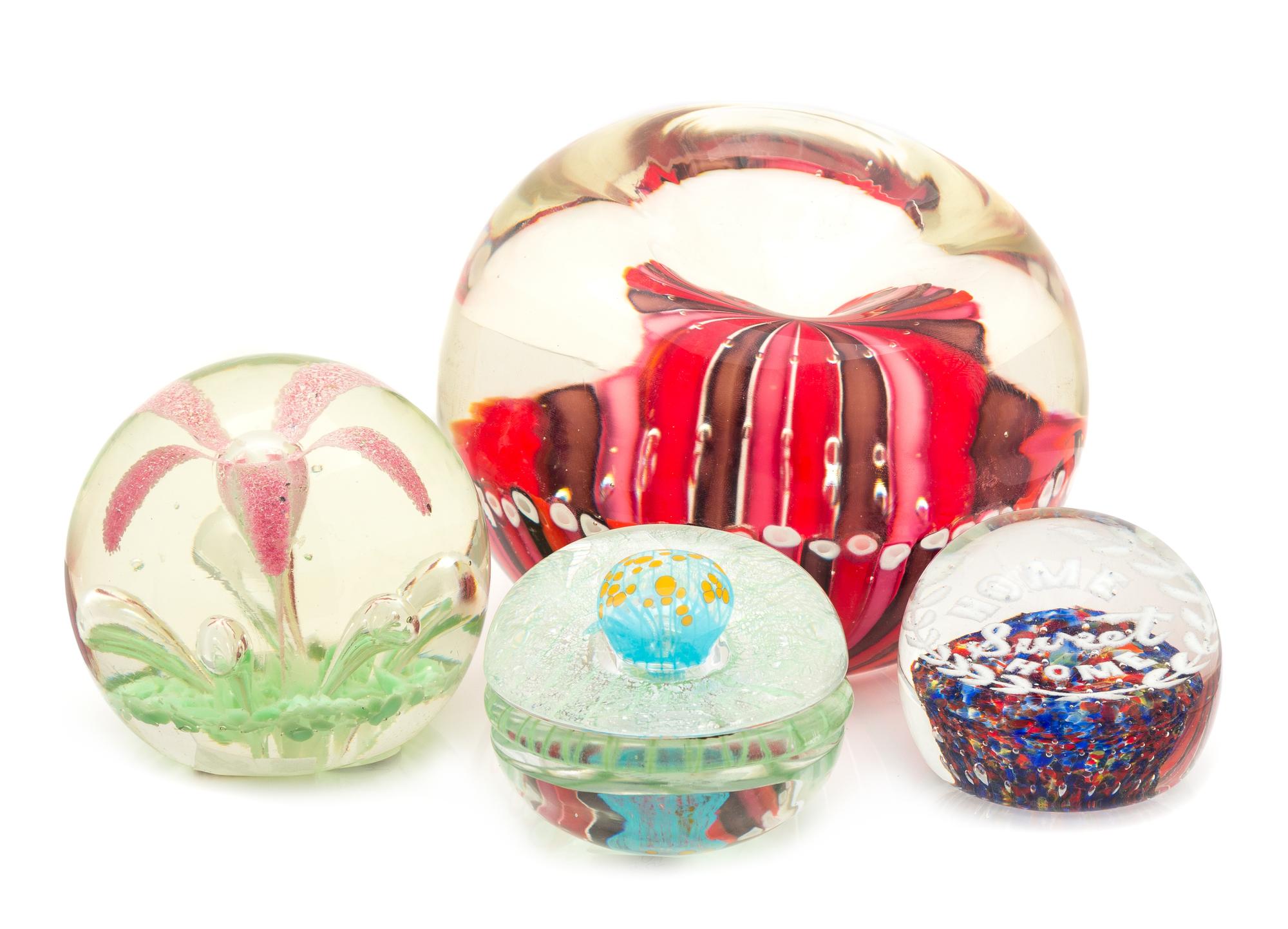A Group of Four Glass Paperweights Diameter of largest 8 inches — SECOND HALF 20TH CENTURY