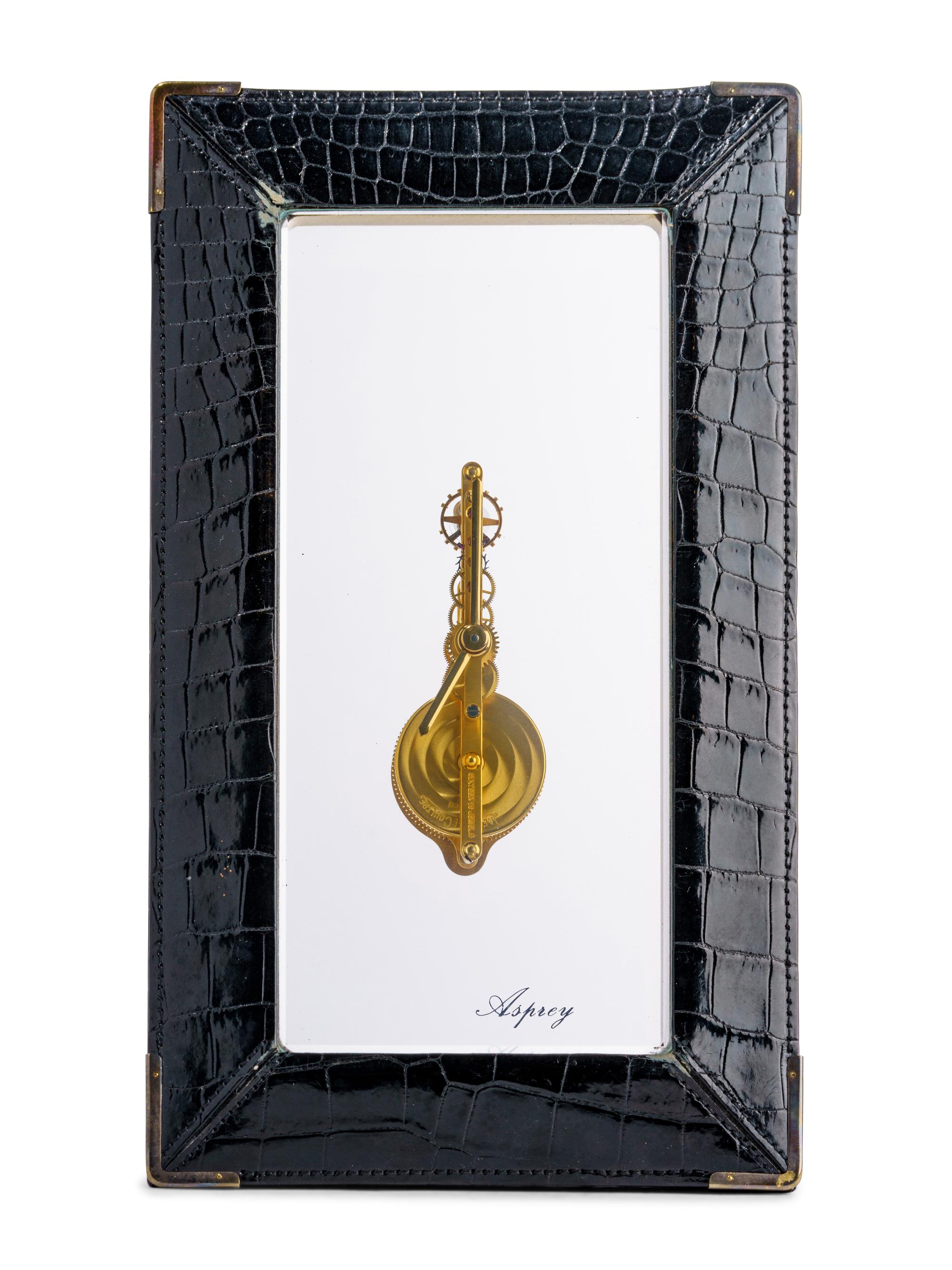 A Jaeger-LeCoultre Brass and Alligator Skeleton Clock Retailed by Asprey & Co.