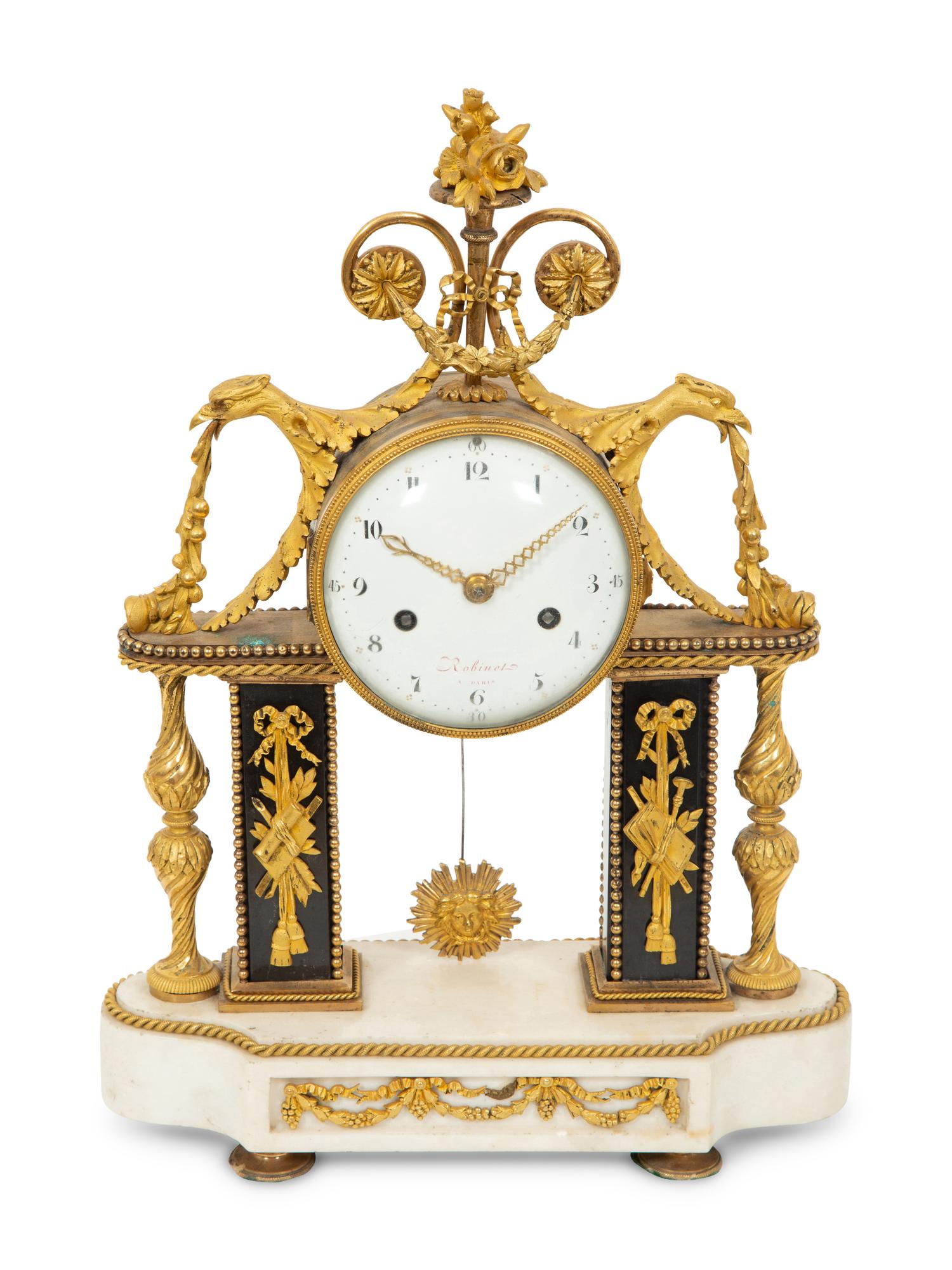 A Louis XVI Gilt Bronze and Marble Mantel Clock