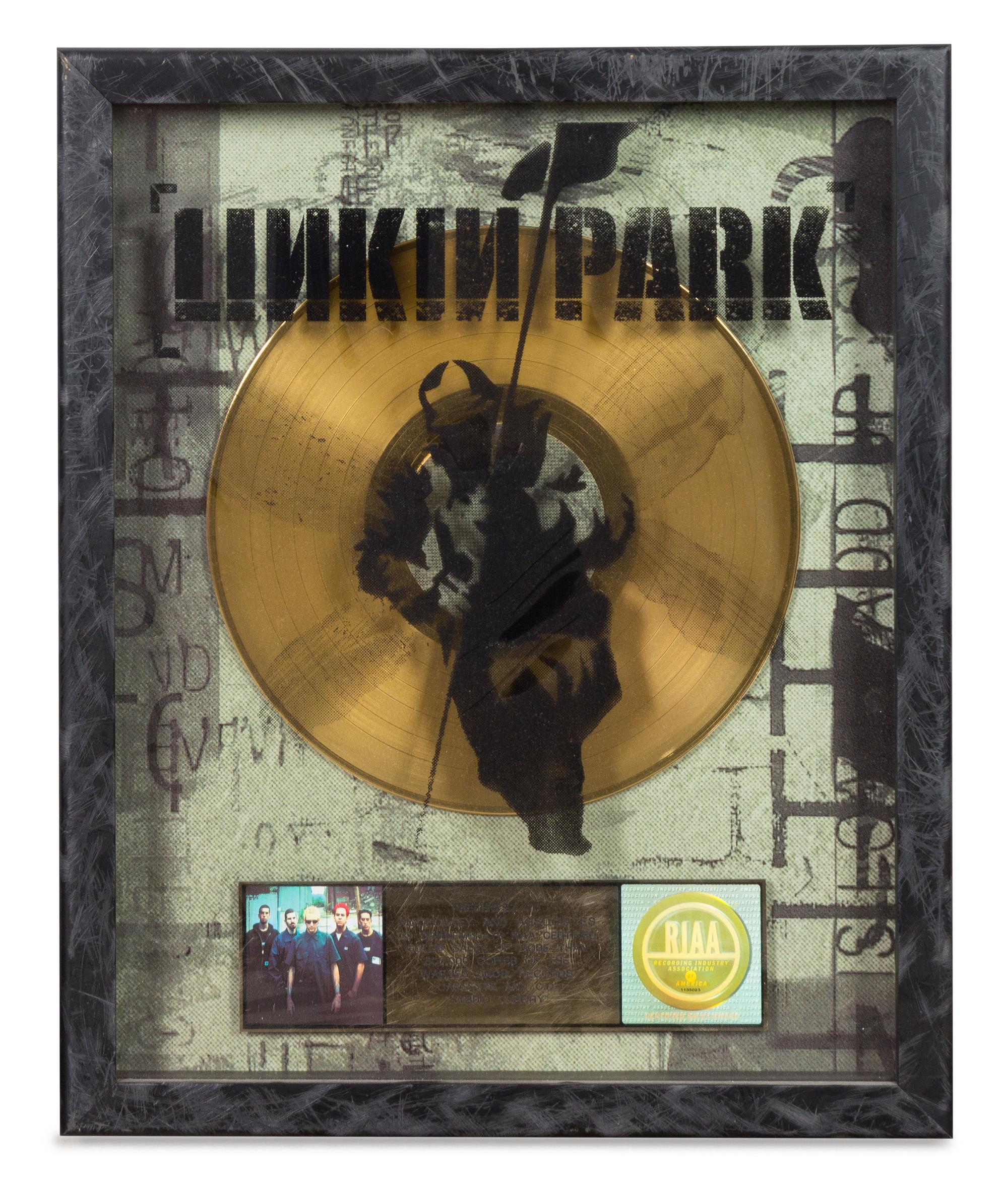 A Linkin Park: Hybrid RIAA Certified Gold Presentation Album 21 1/2 x 17 1/2 inches.