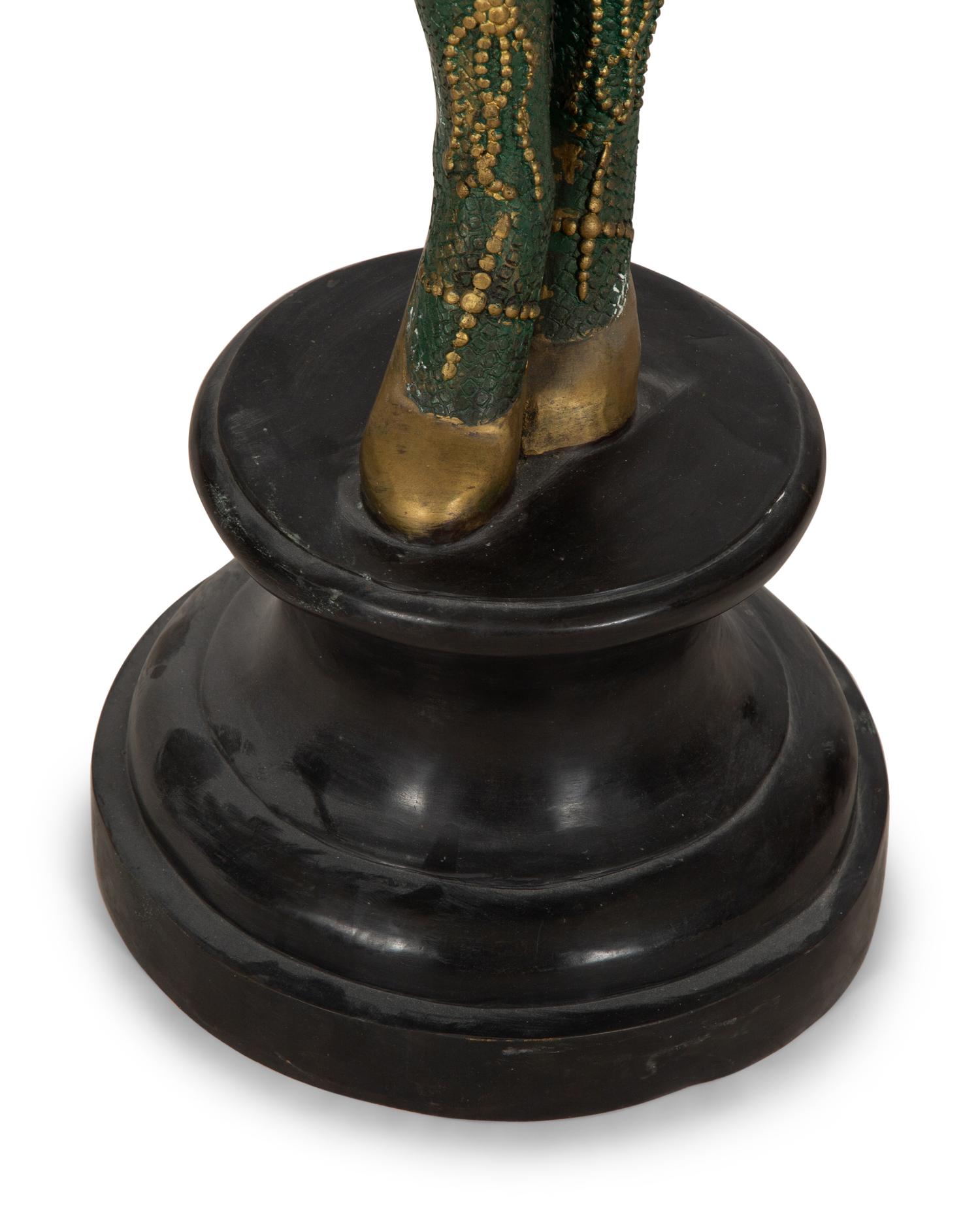 A Polychromed Metal Figural Floor Lamp in the Style of Chiparus