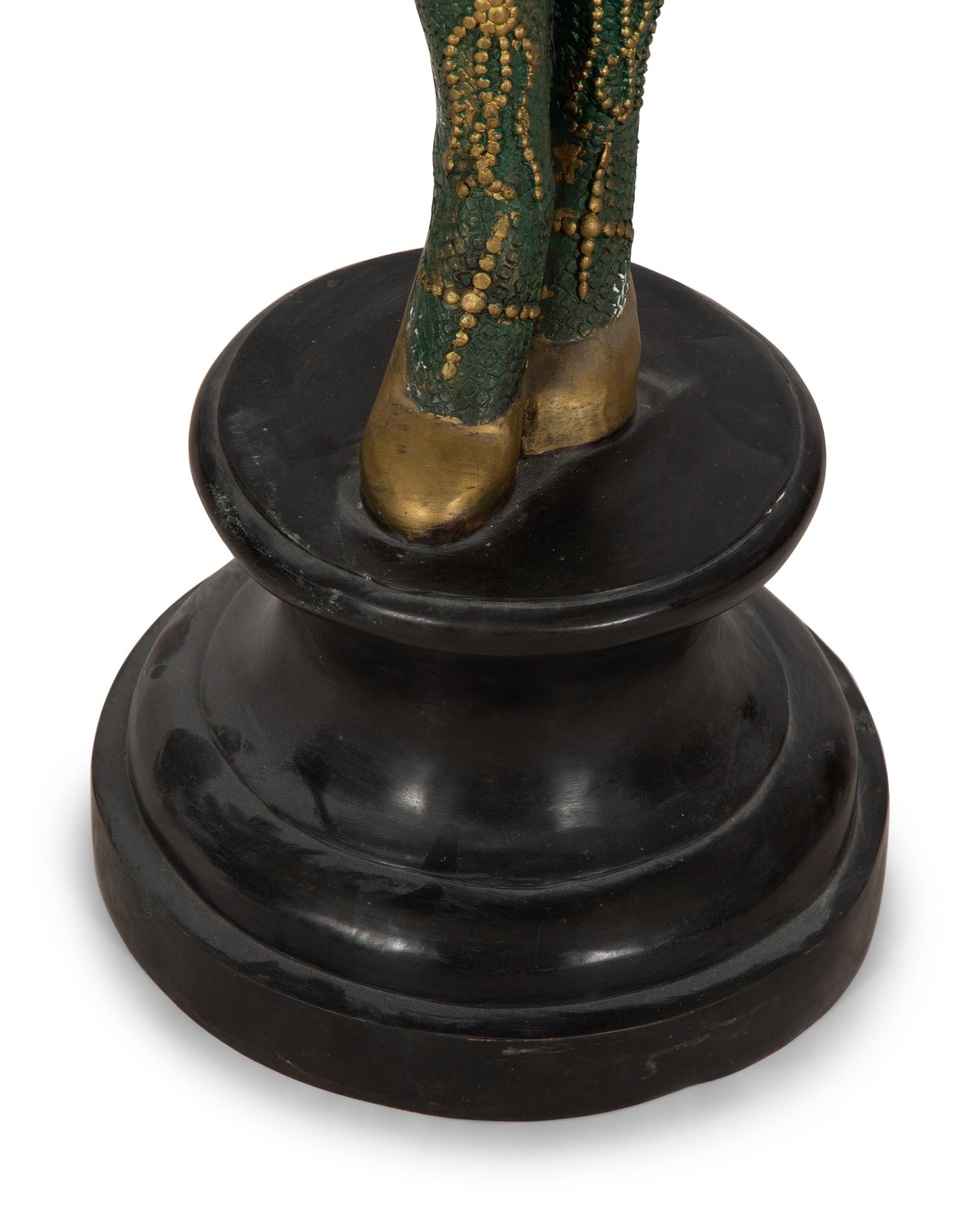 A Polychromed Metal Figural Floor Lamp in the Style of Chiparus