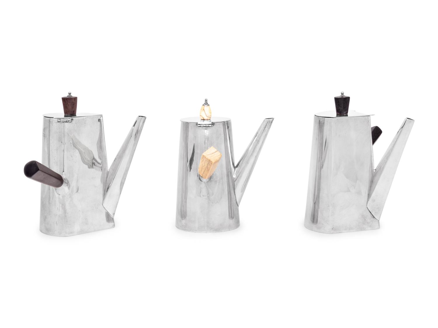 Two Victorian Silver Bachelor's Coffee Pots