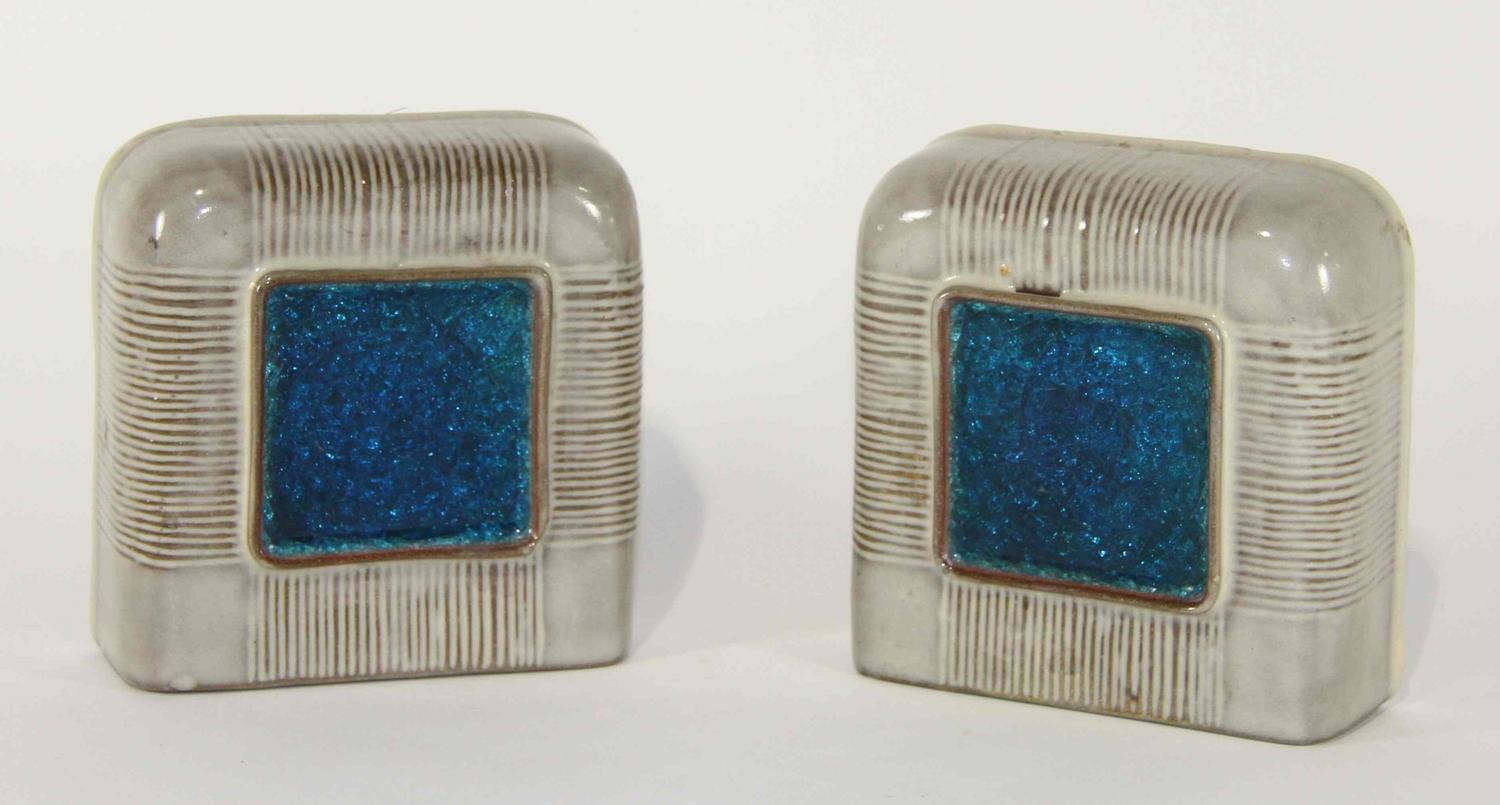 A Pair of Ceramic Bookends Height 6 1/2 inches.