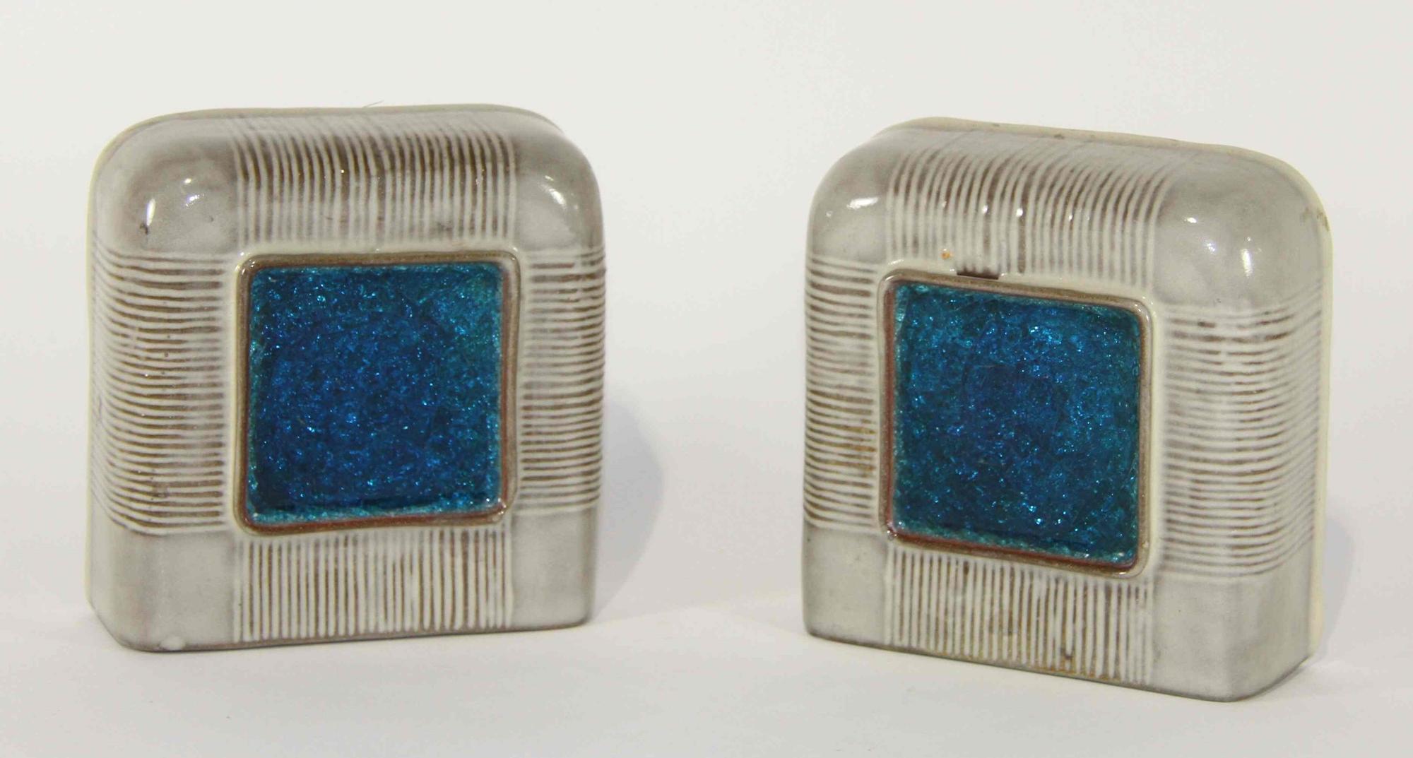 A Pair of Ceramic Bookends Height 6 1/2 inches.