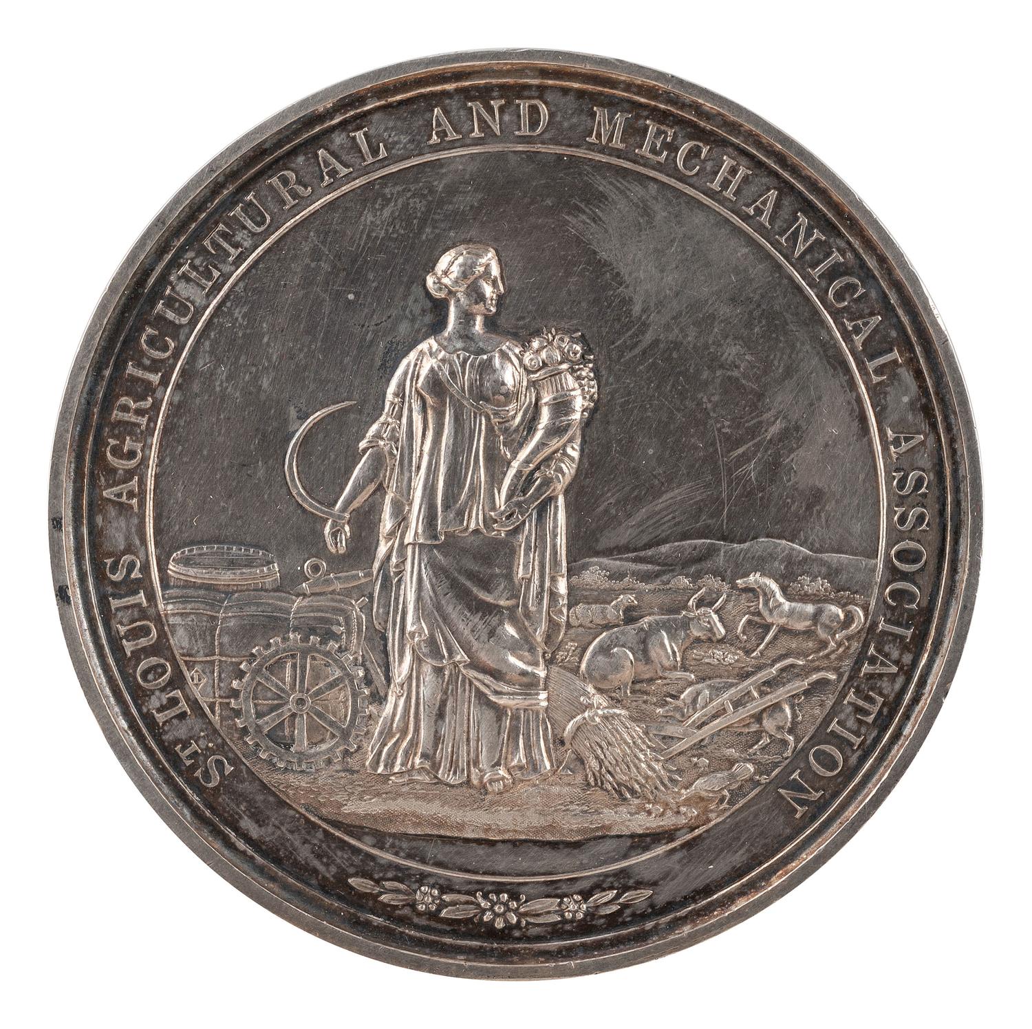 [AGRICULTURE]. St. Louis Agricultural and Mechanical Association silver presentation medal. Ca 1870s.