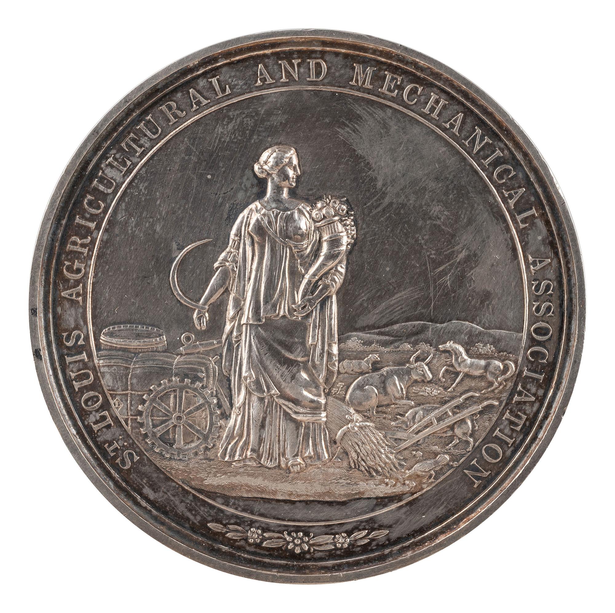 [AGRICULTURE]. St. Louis Agricultural and Mechanical Association silver presentation medal. Ca 1870s.