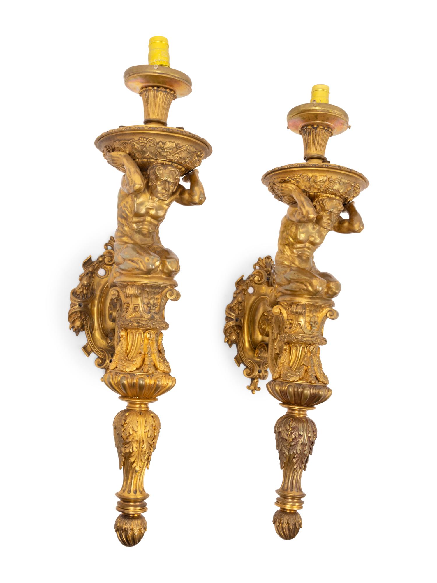 A Pair of Continental Gilt Bronze Figural Single-Light Figural Sconces