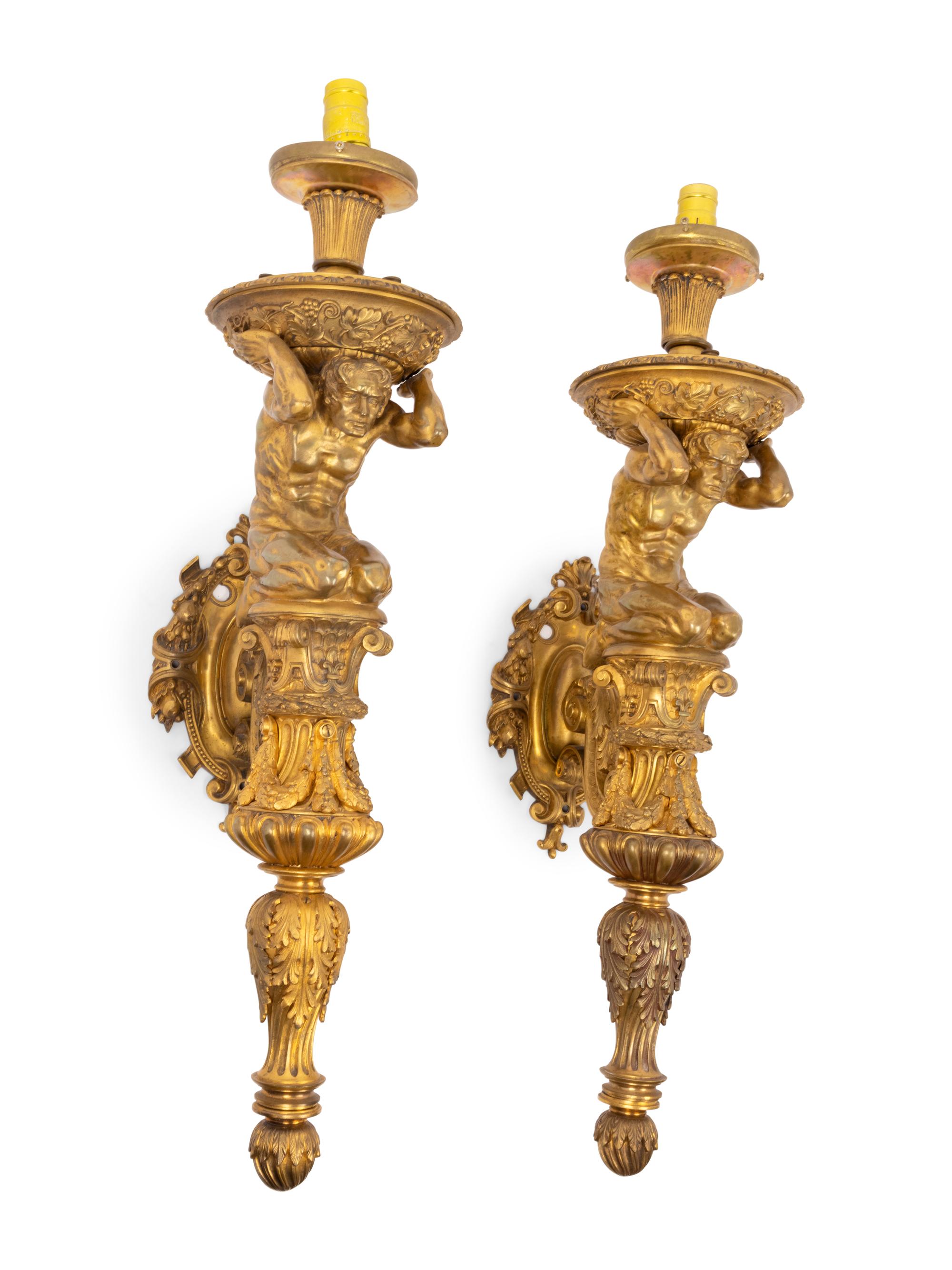 A Pair of Continental Gilt Bronze Figural Single-Light Figural Sconces