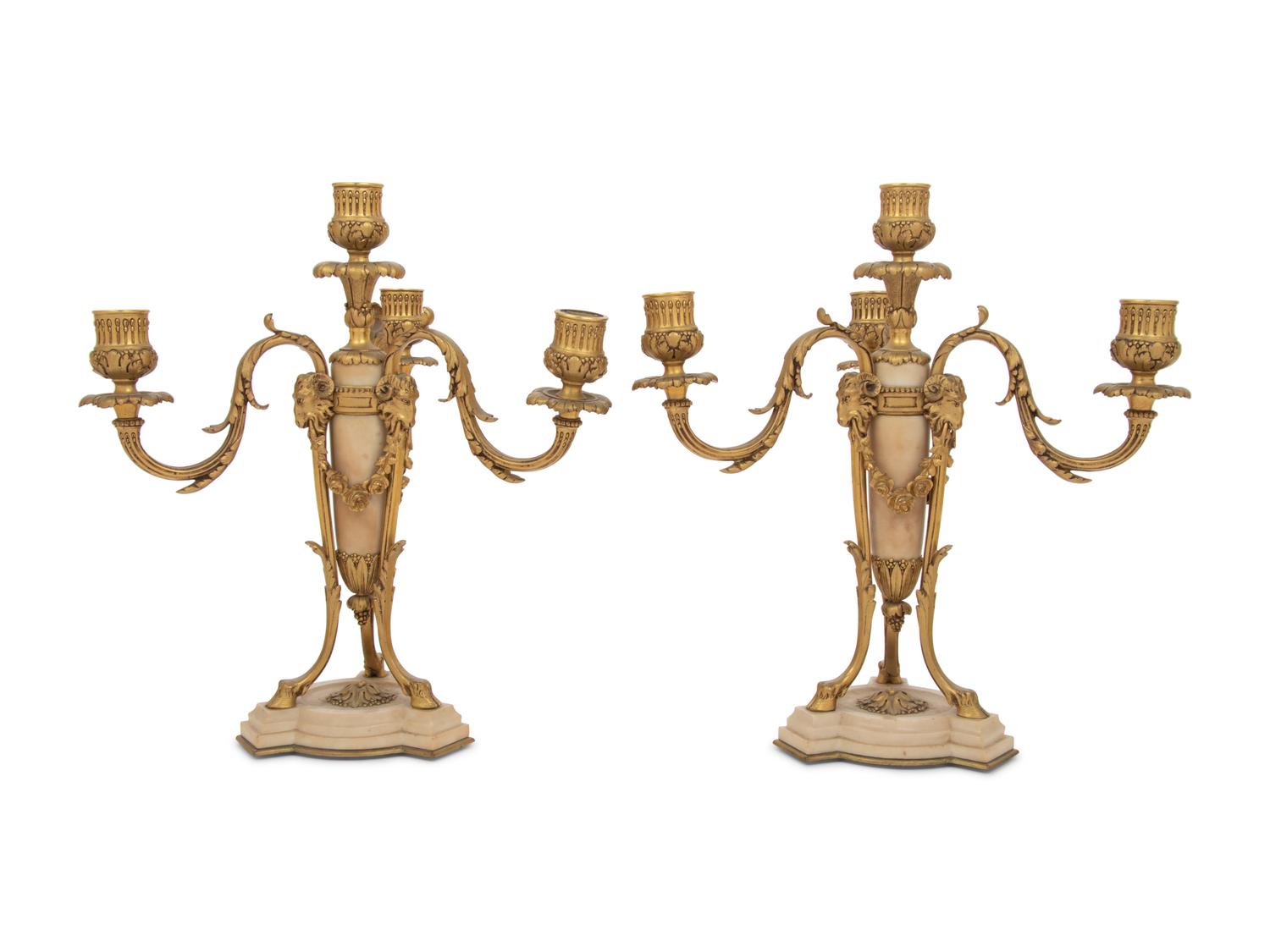 A Pair of French Gilt Bronze and Alabaster Four-Light Candelabra