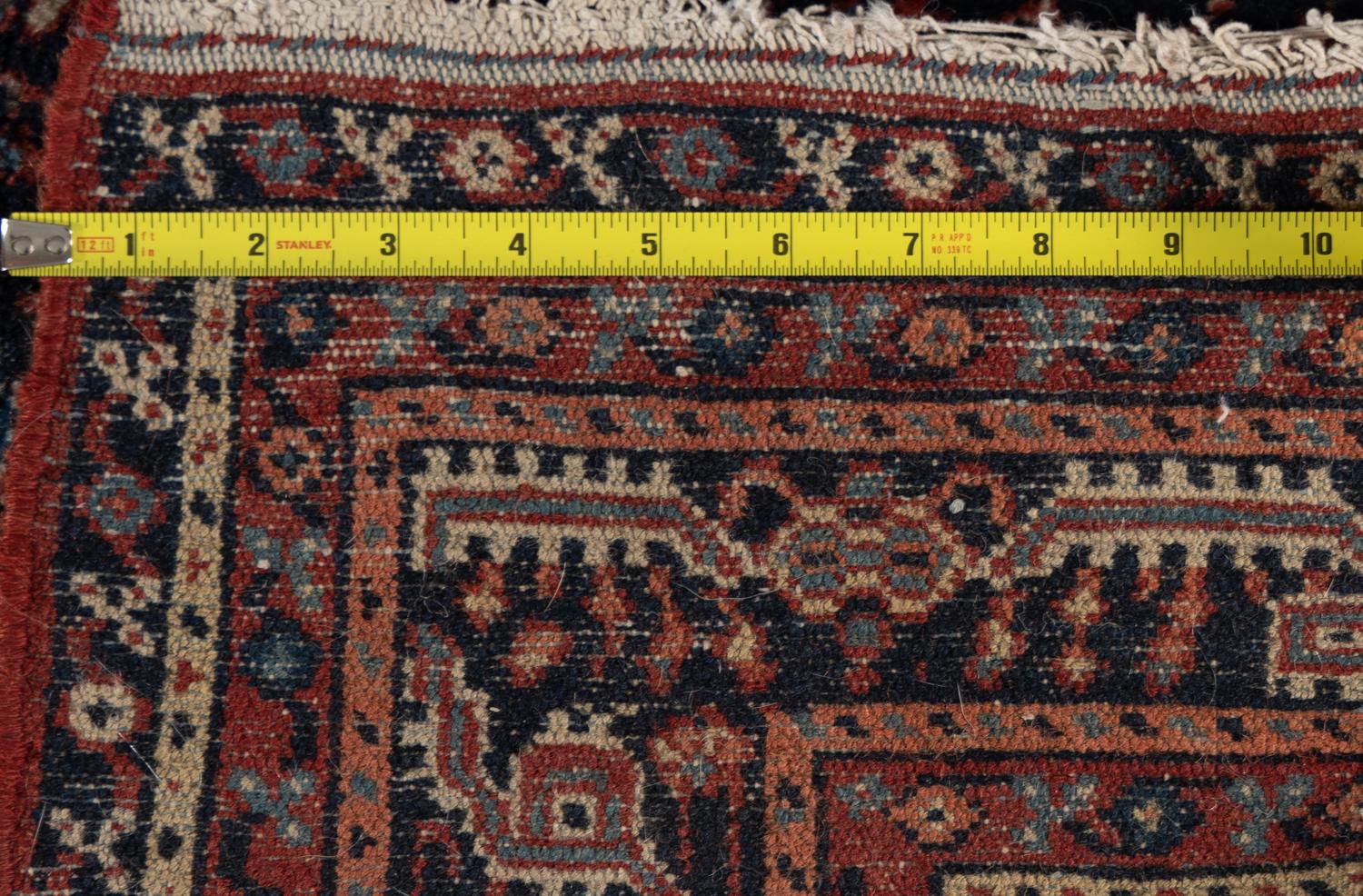A Heriz Wool Rug