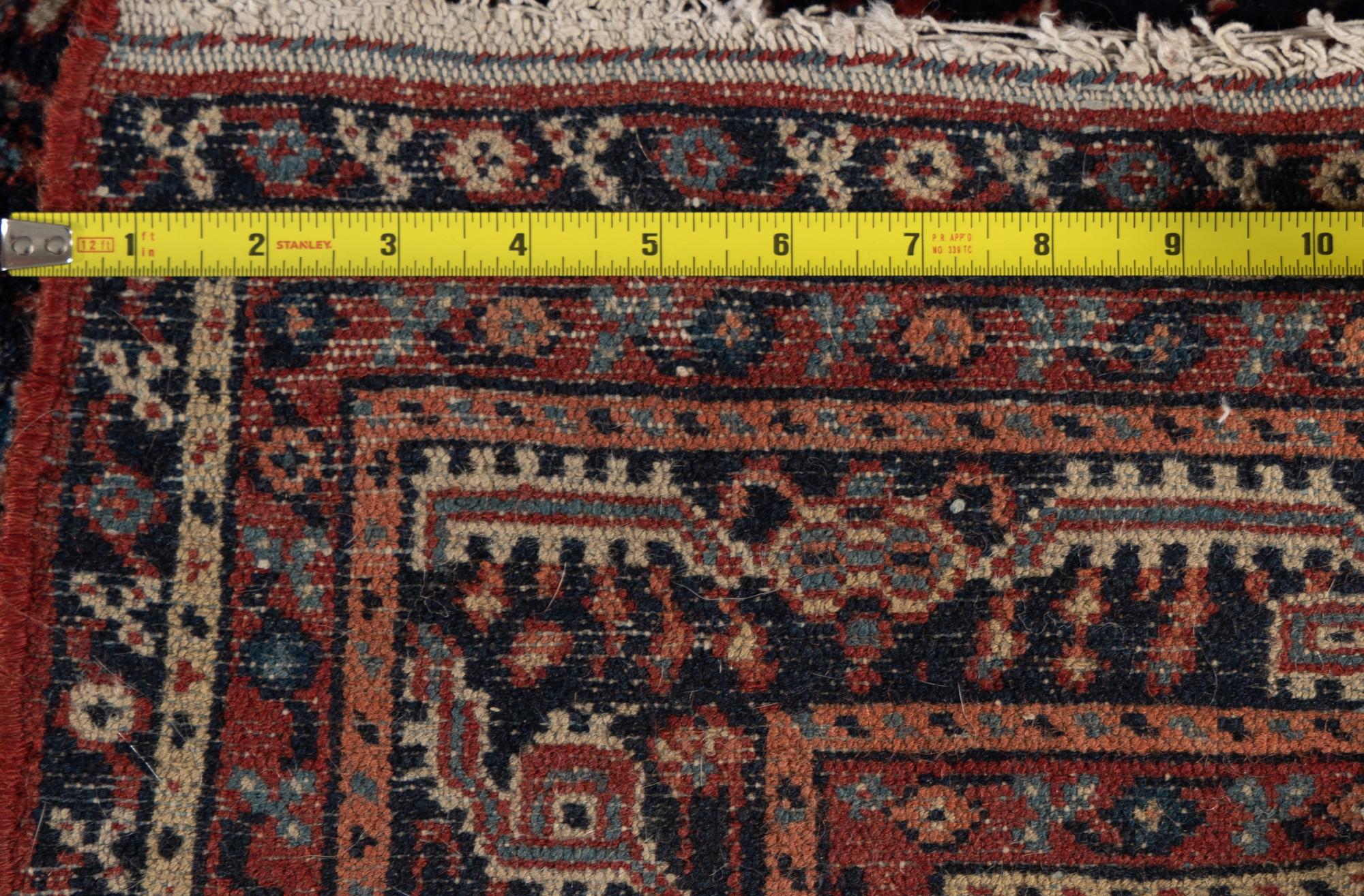 A Heriz Wool Rug