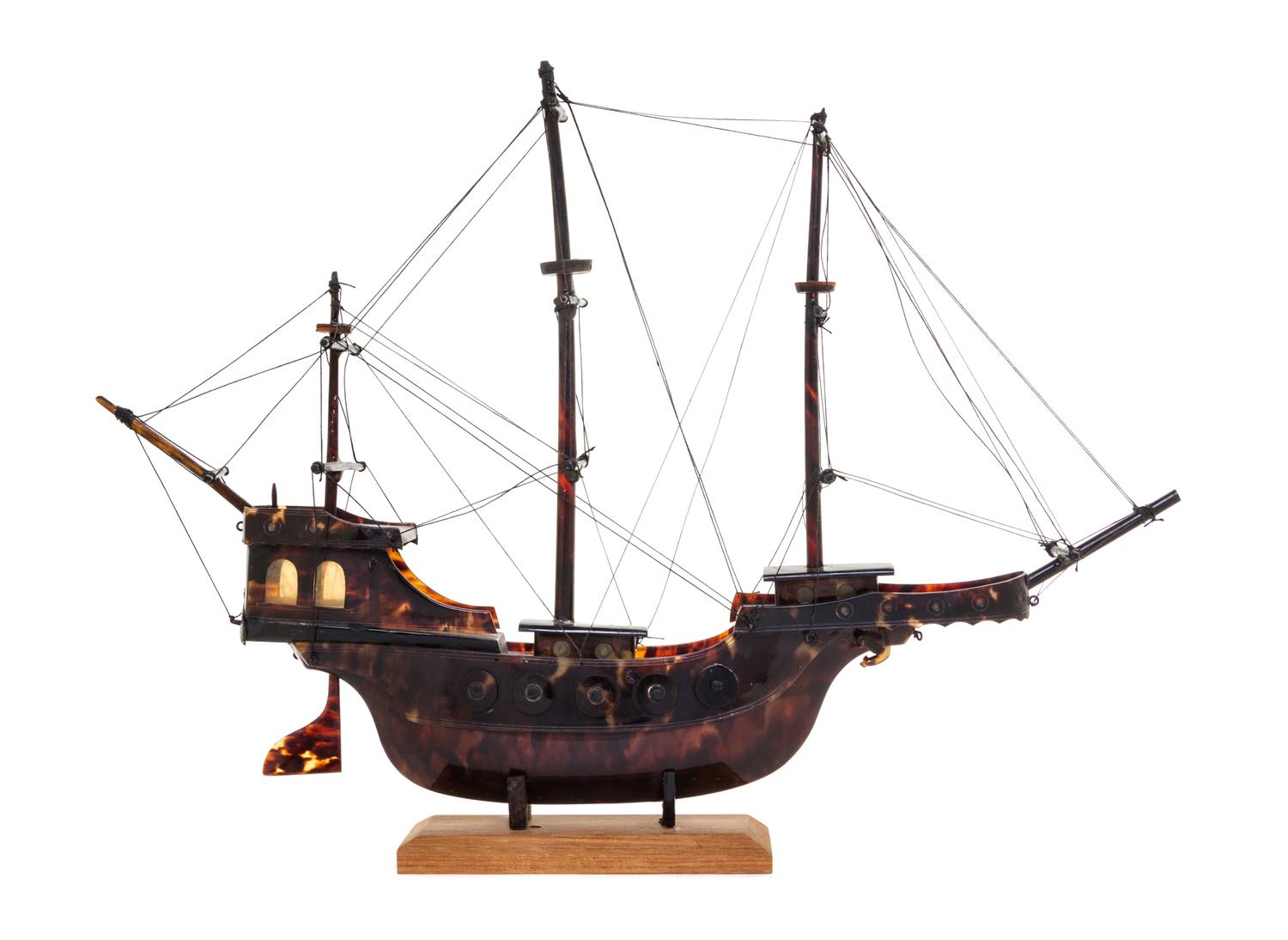 A Hand Carved Tortoise Shell Model of a Ship Width 13 3/4 inches. — 19TH/20TH CENTURY