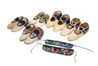 Five Pairs of Great Lakes Region Beaded Moccasins Length of largest 11 inches.