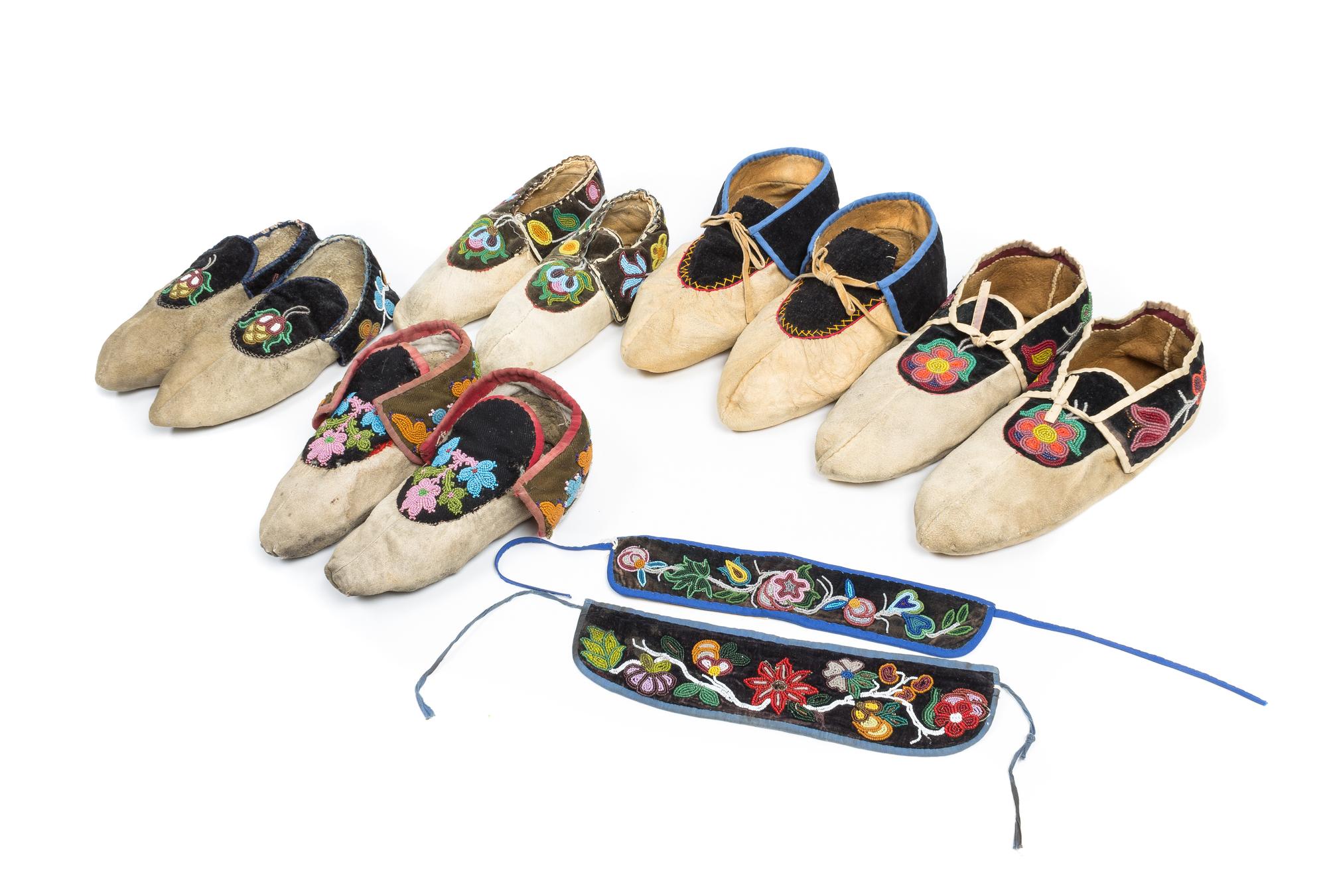 Five Pairs of Great Lakes Region Beaded Moccasins Length of largest 11 inches.