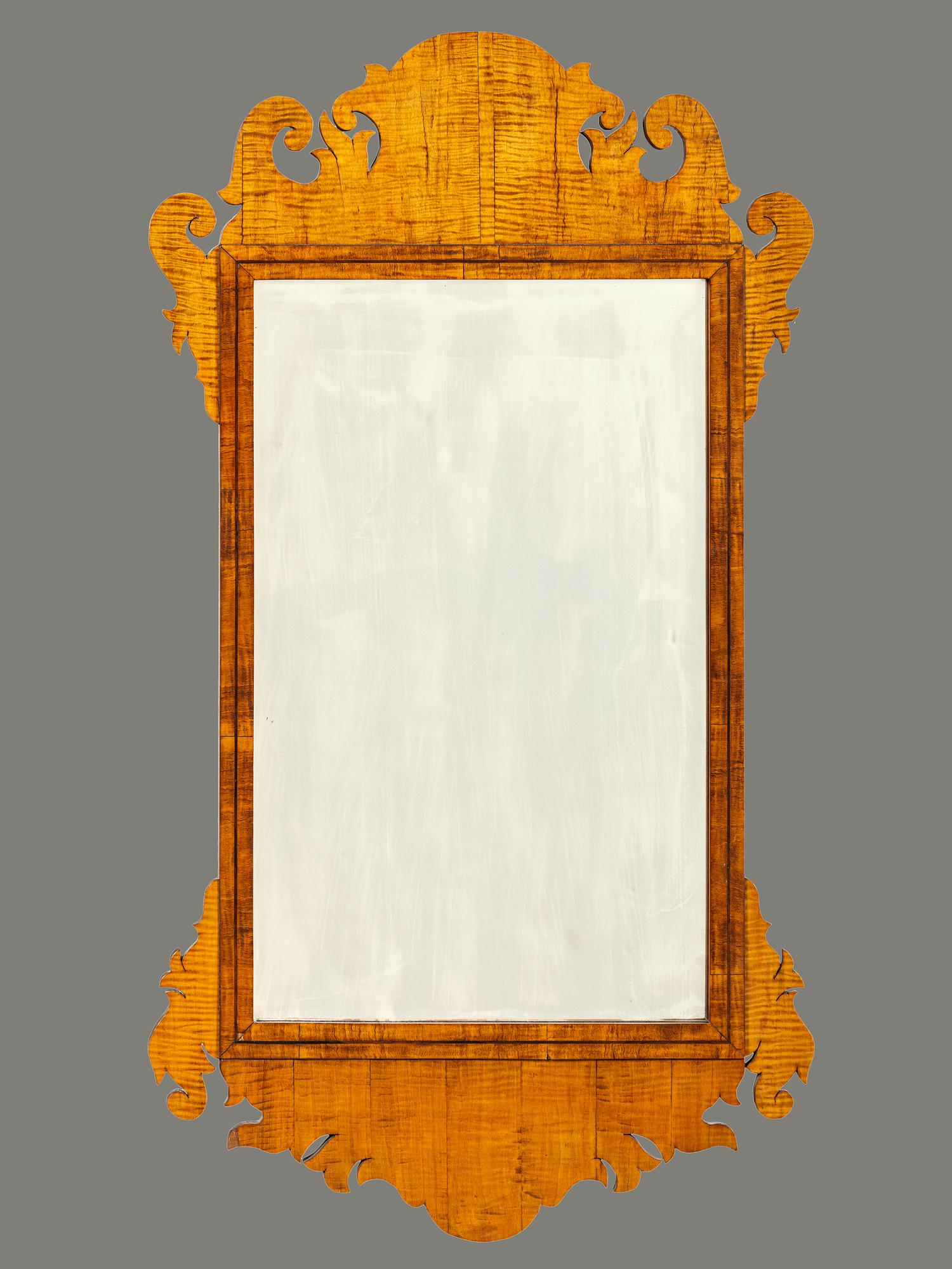 A Chippendale Style Tiger Maple Looking Glass