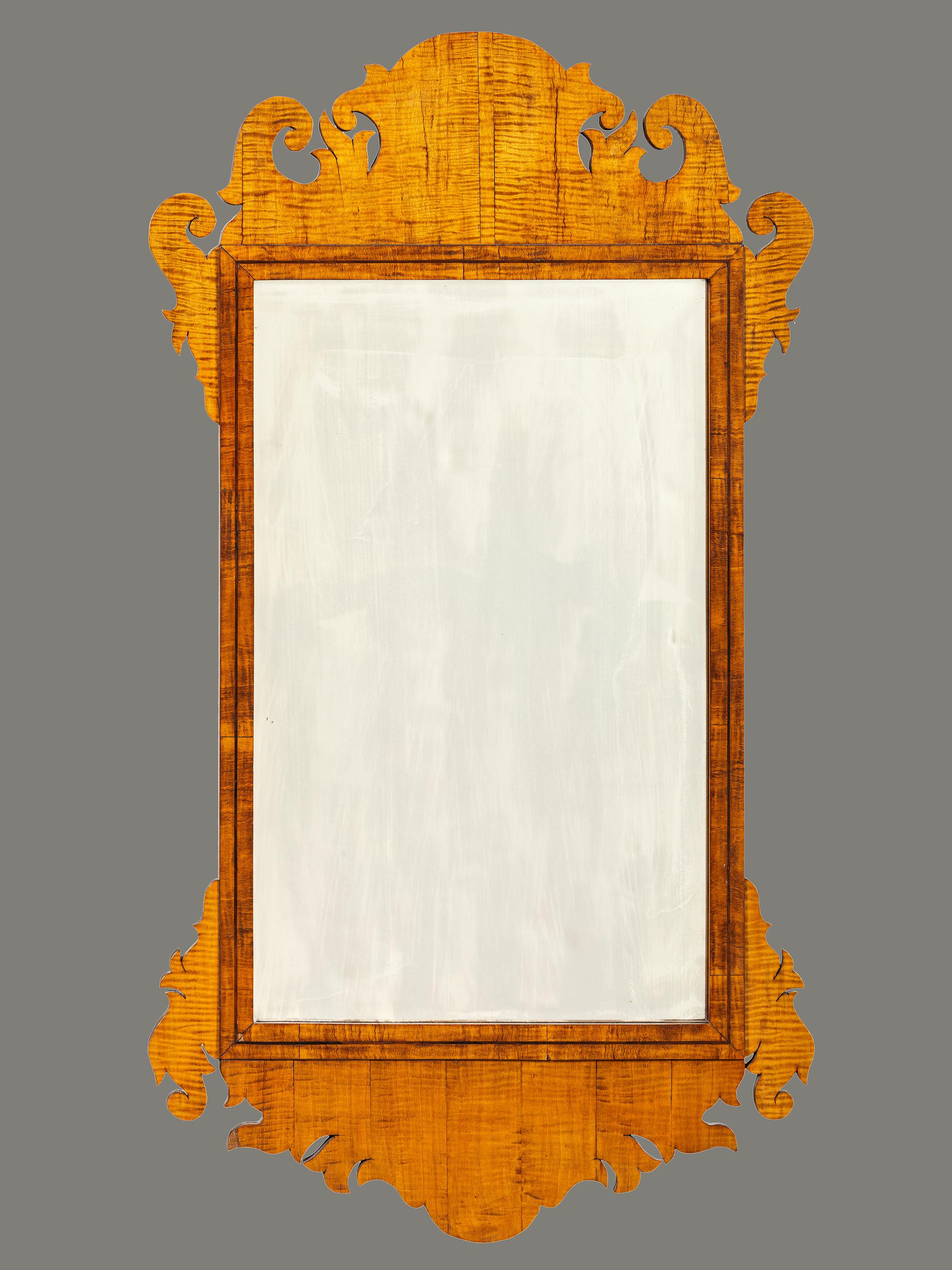 A Chippendale Style Tiger Maple Looking Glass